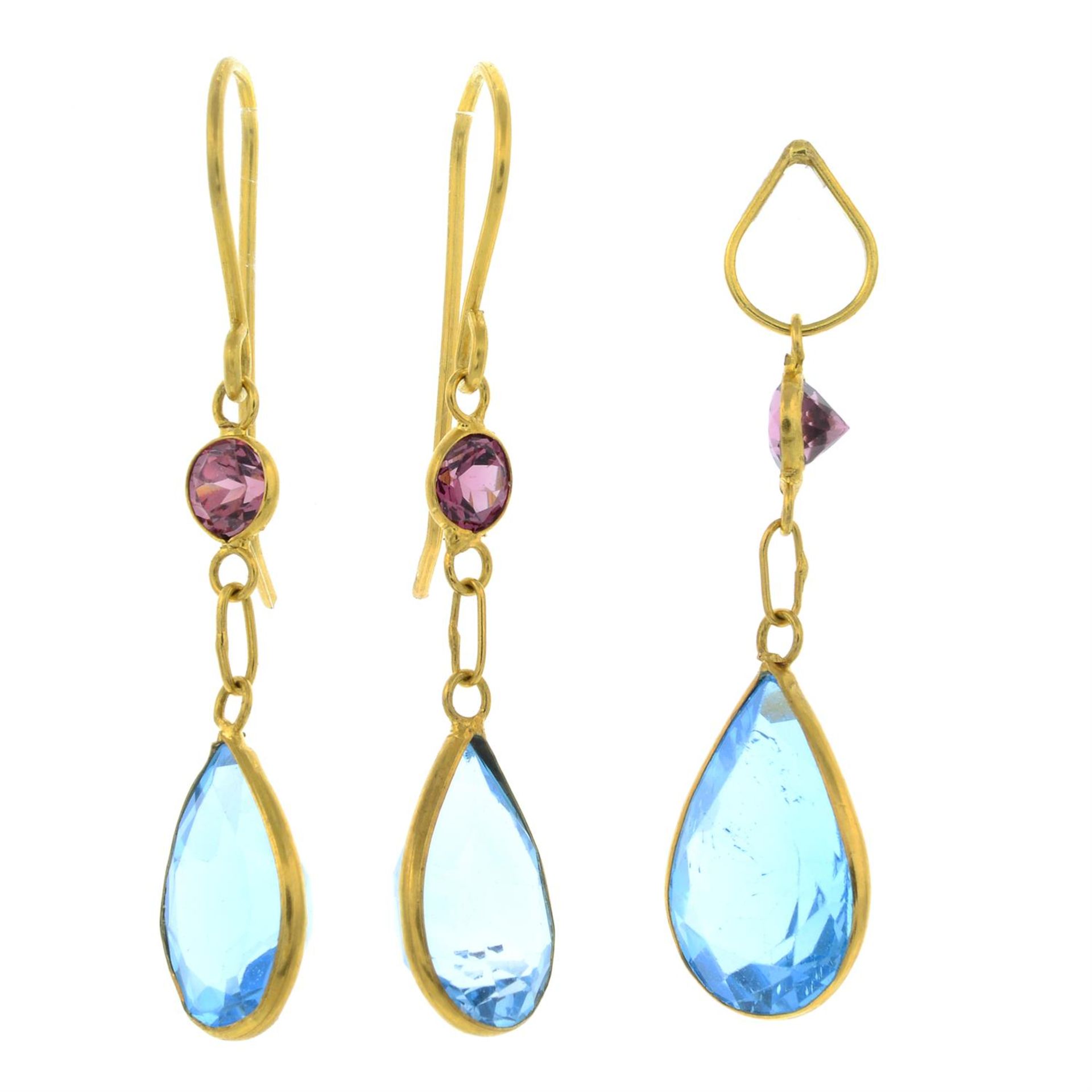 A pair of topaz and pink tourmaline drop earrings and a topaz and pink tourmaline drop pendant.