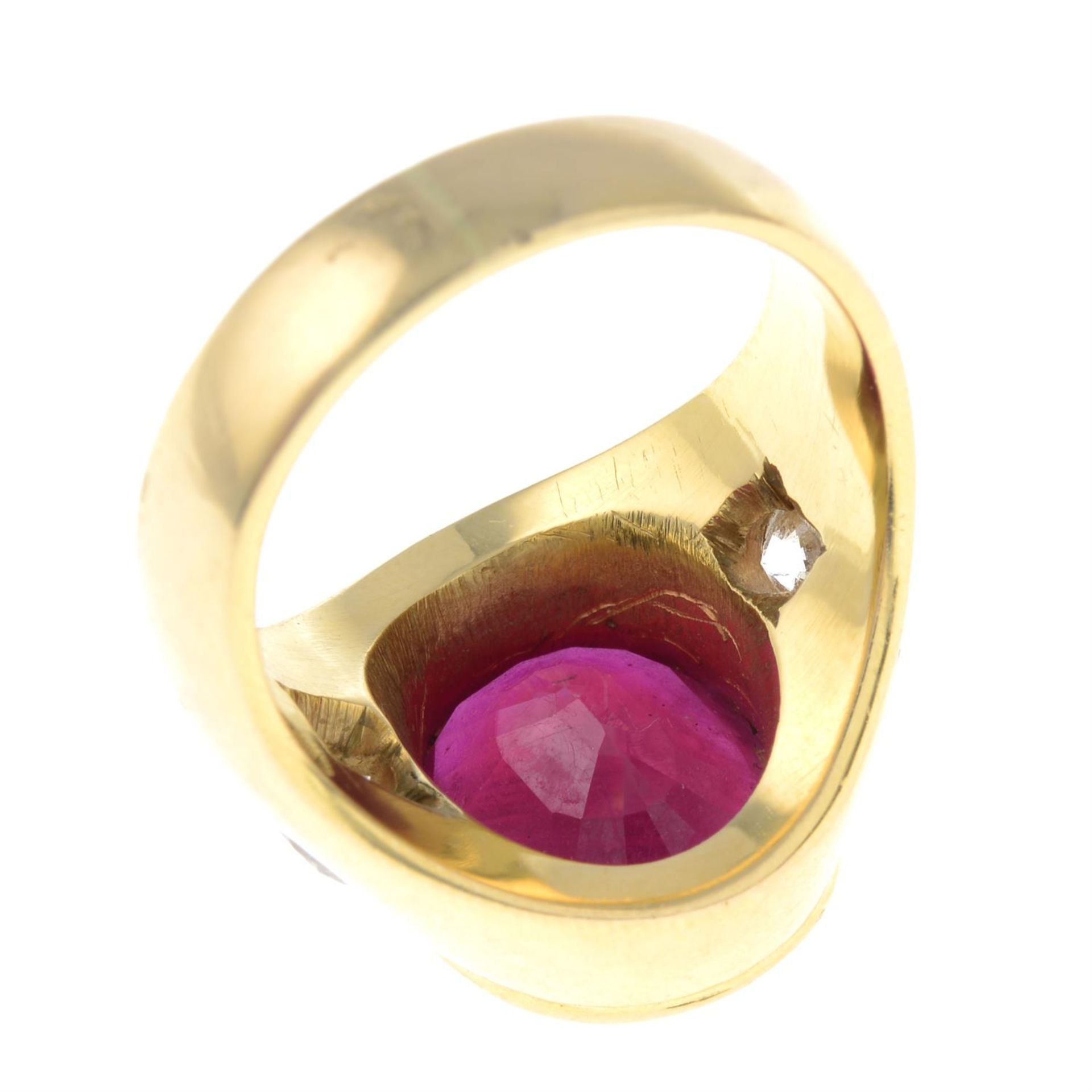 A glass-filled ruby and diamond three-stone ring. - Image 2 of 3