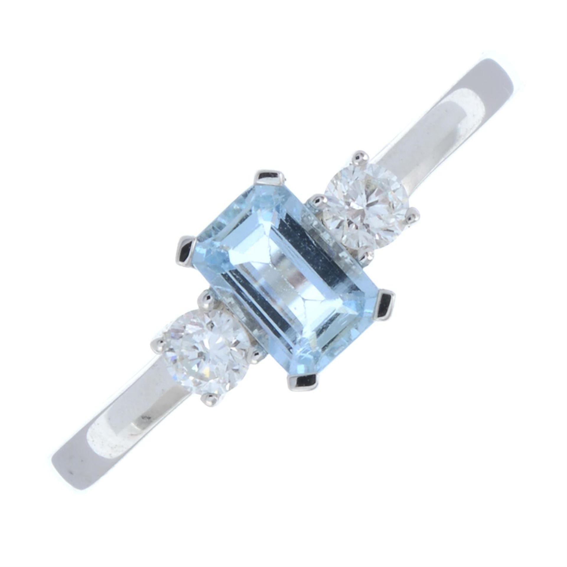 An 18ct gold aquamarine and brilliant-cut diamond three-stone ring.
