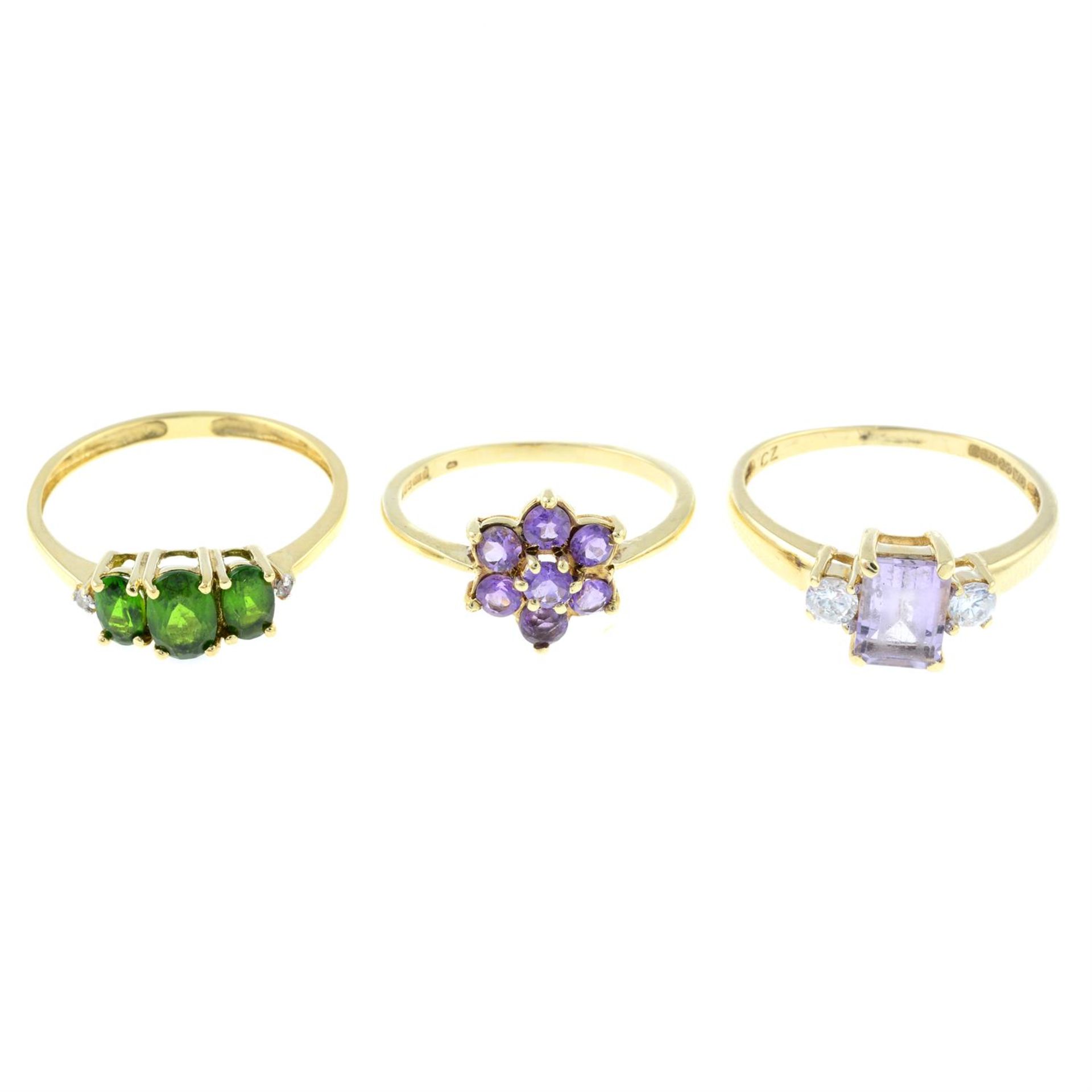 Three 9ct gold gem-set rings.