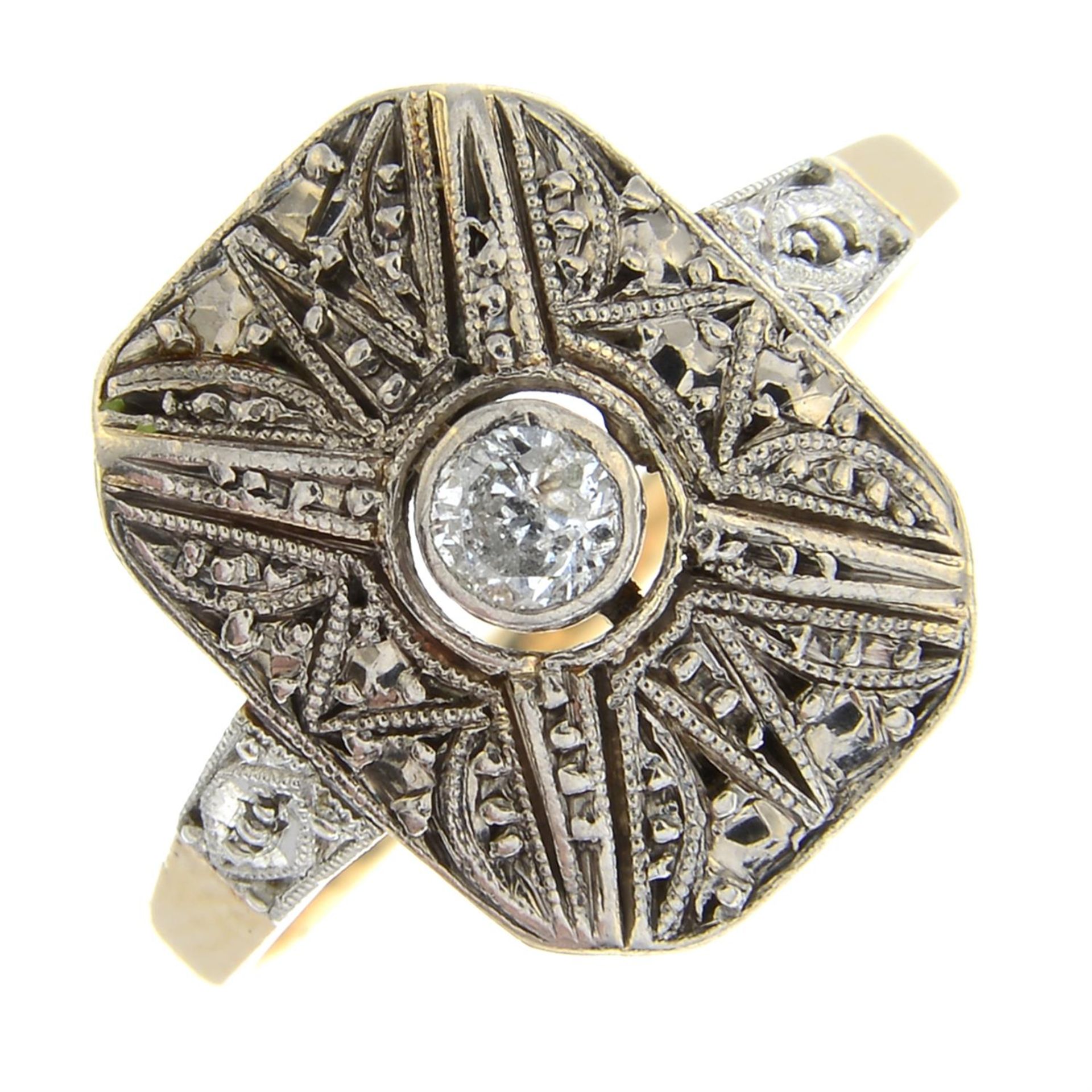 A mid 20th century gold diamond single-stone dress ring.