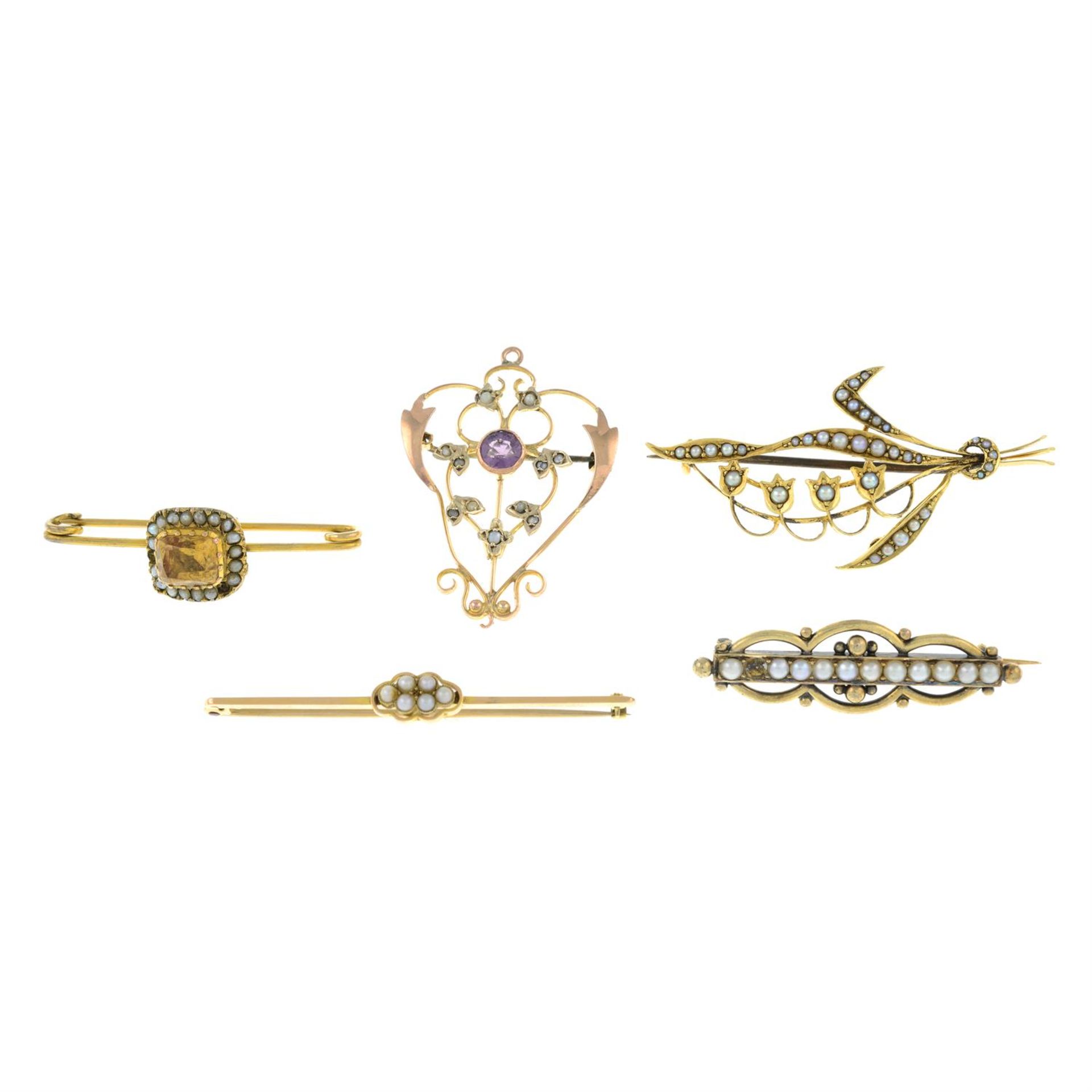 Five late 19th century and later gem-set brooches.