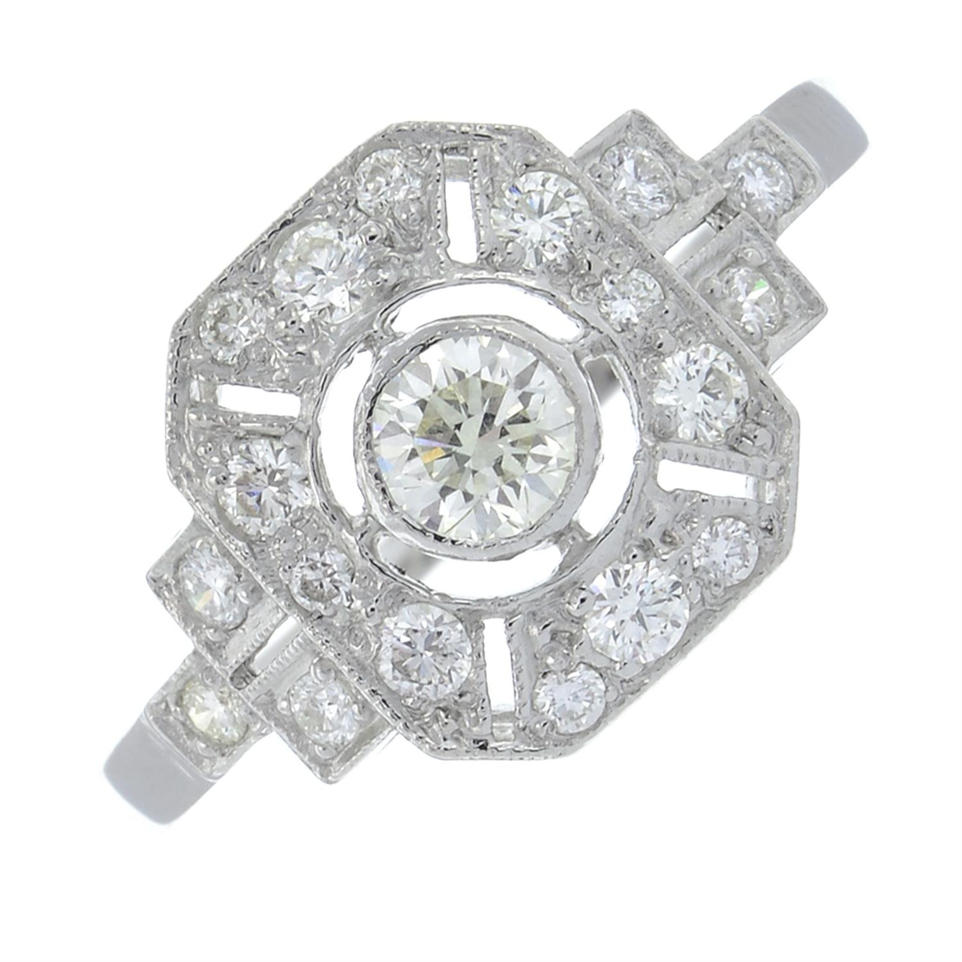 A brilliant-cut diamond openwork geometric dress ring.