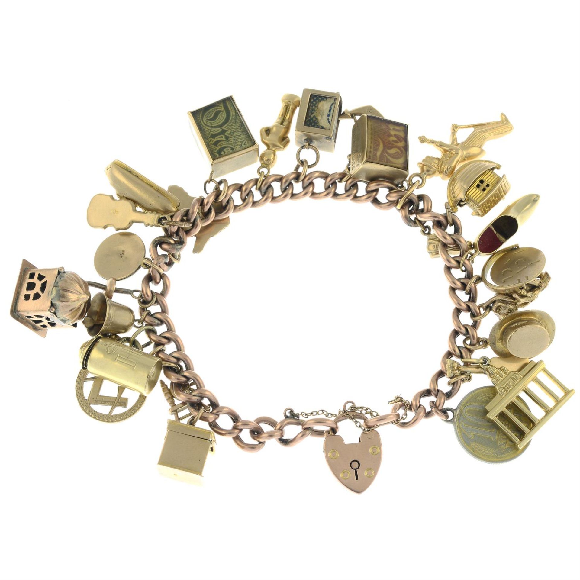 A 9ct gold charm bracelet, suspending twenty-five assorted charms, to include a 'Noah's Ark',