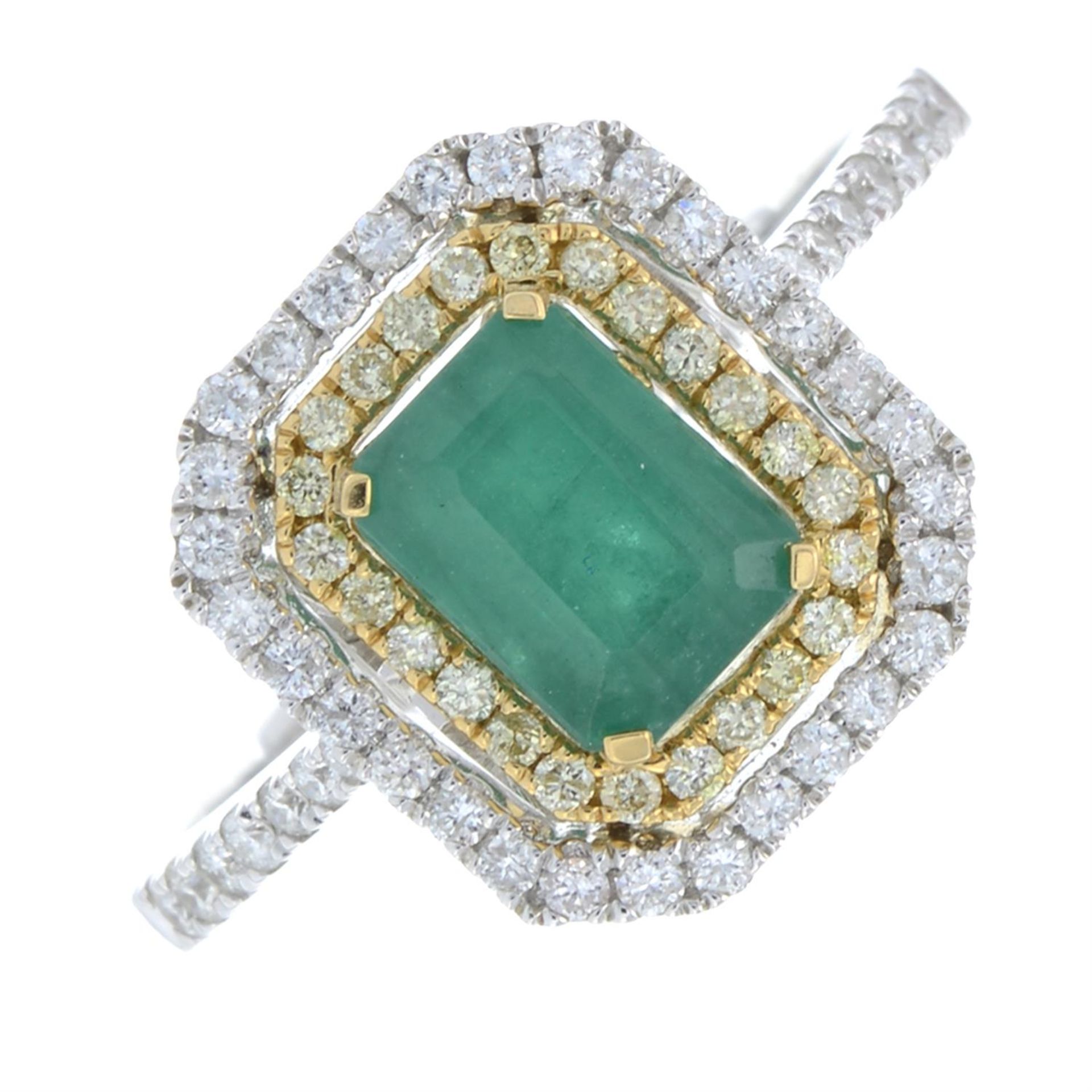 An 18ct bi-colour gold emerald, brilliant-cut diamond and 'yellow' diamond cluster ring.