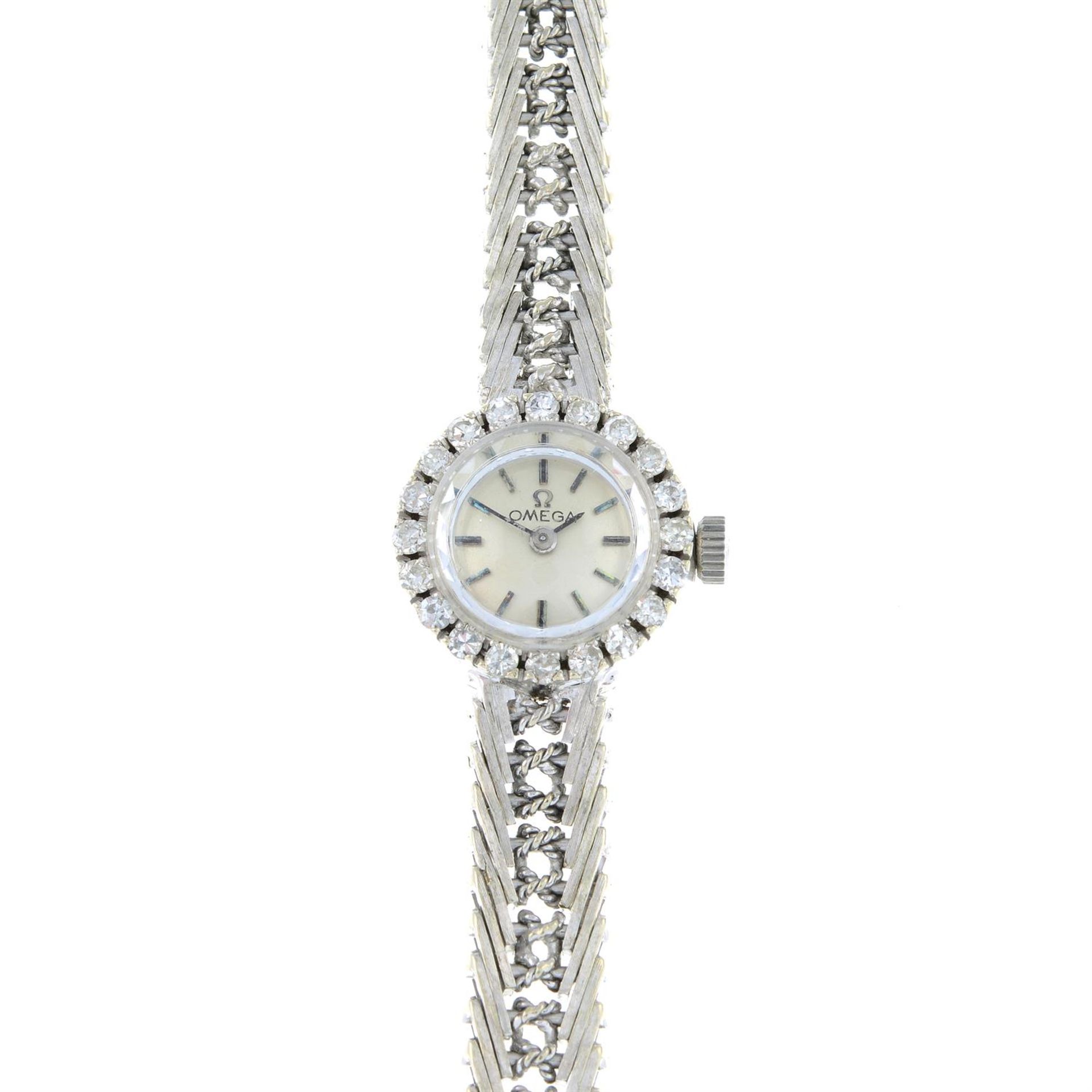 A lady's diamond cocktail watch, by Omega.