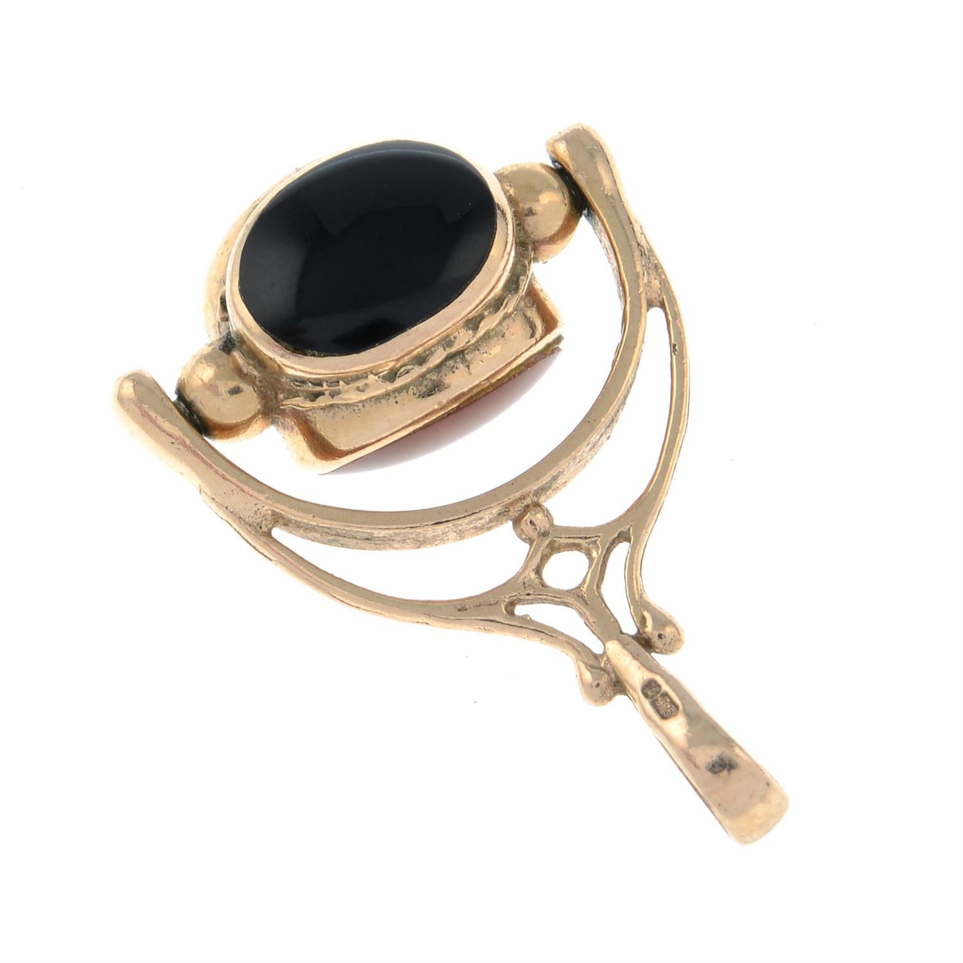 A 9ct gold carnelian, bloodstone and onyx swivel fob charm. - Image 2 of 2