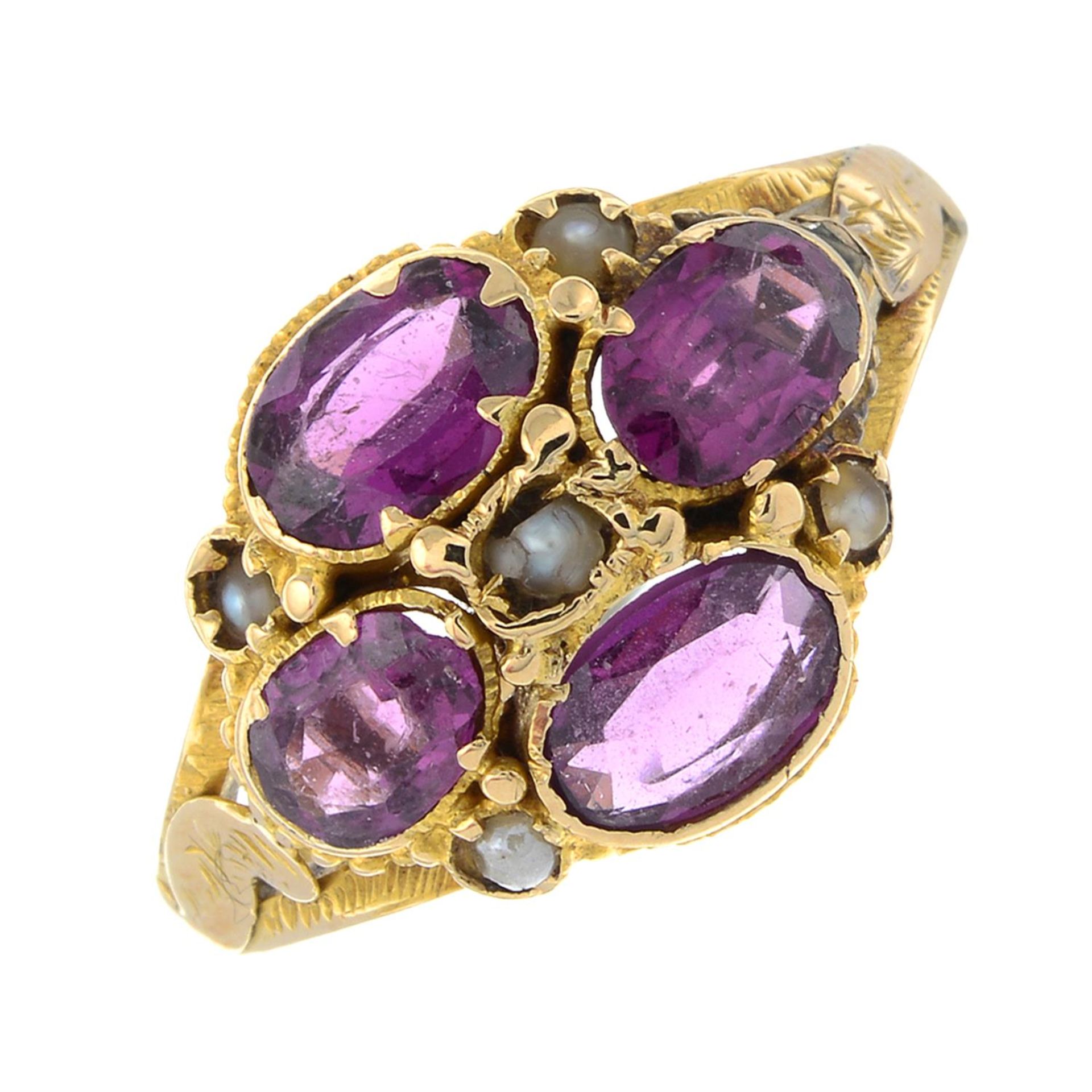 A mid to late 19th century gold garnet and split pearl cluster ring.