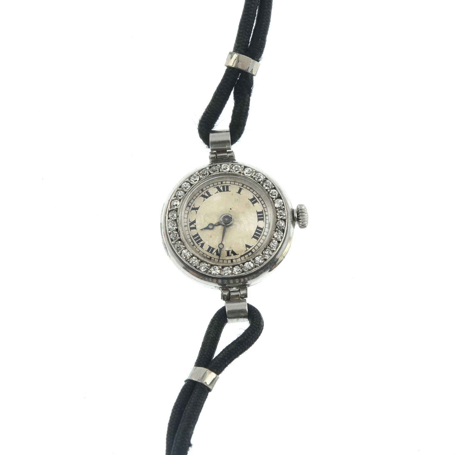 An early 20th century platinum cocktail watch, with od-cut diamond bezel.