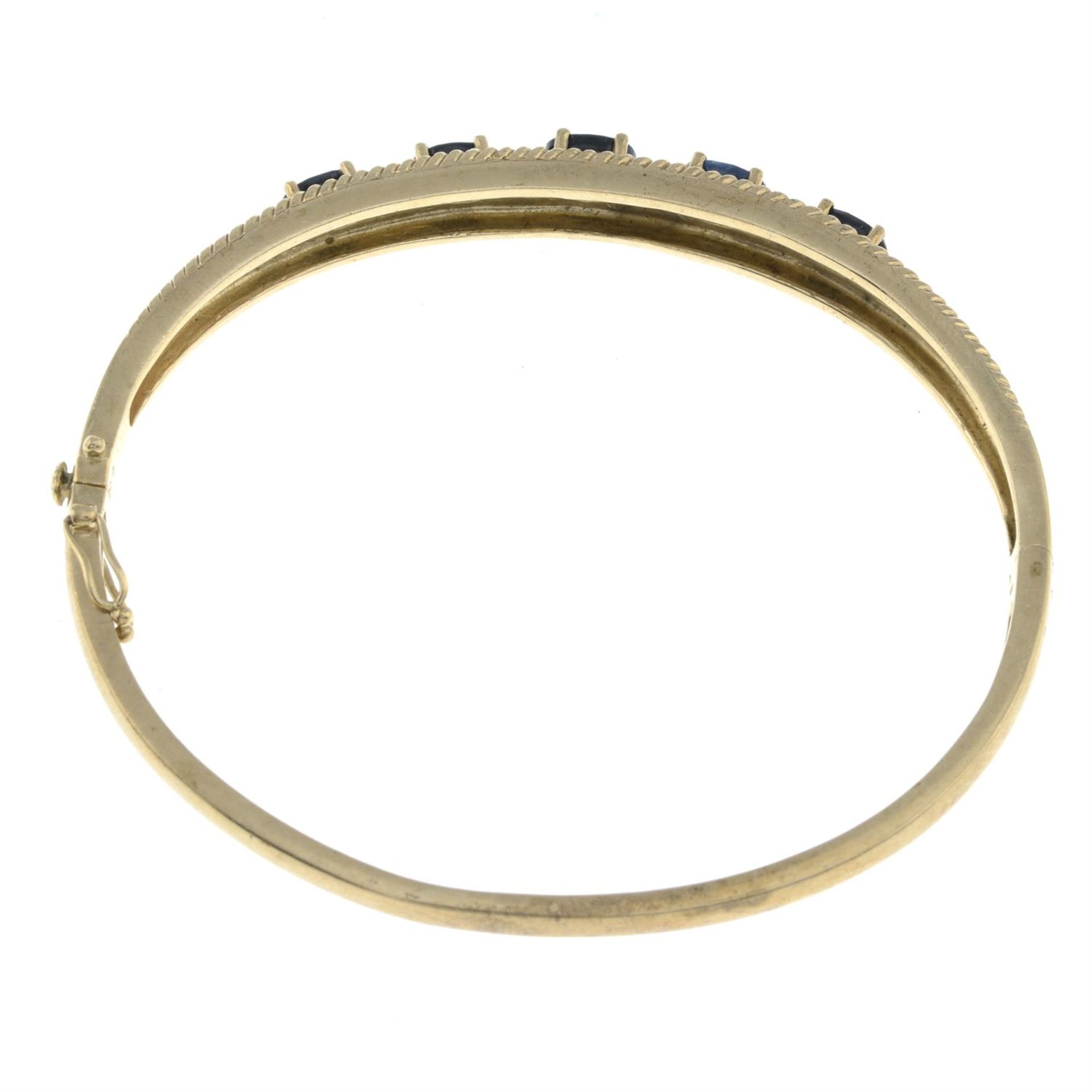 A 9ct gold sapphire and diamond hinged bangle. - Image 2 of 2