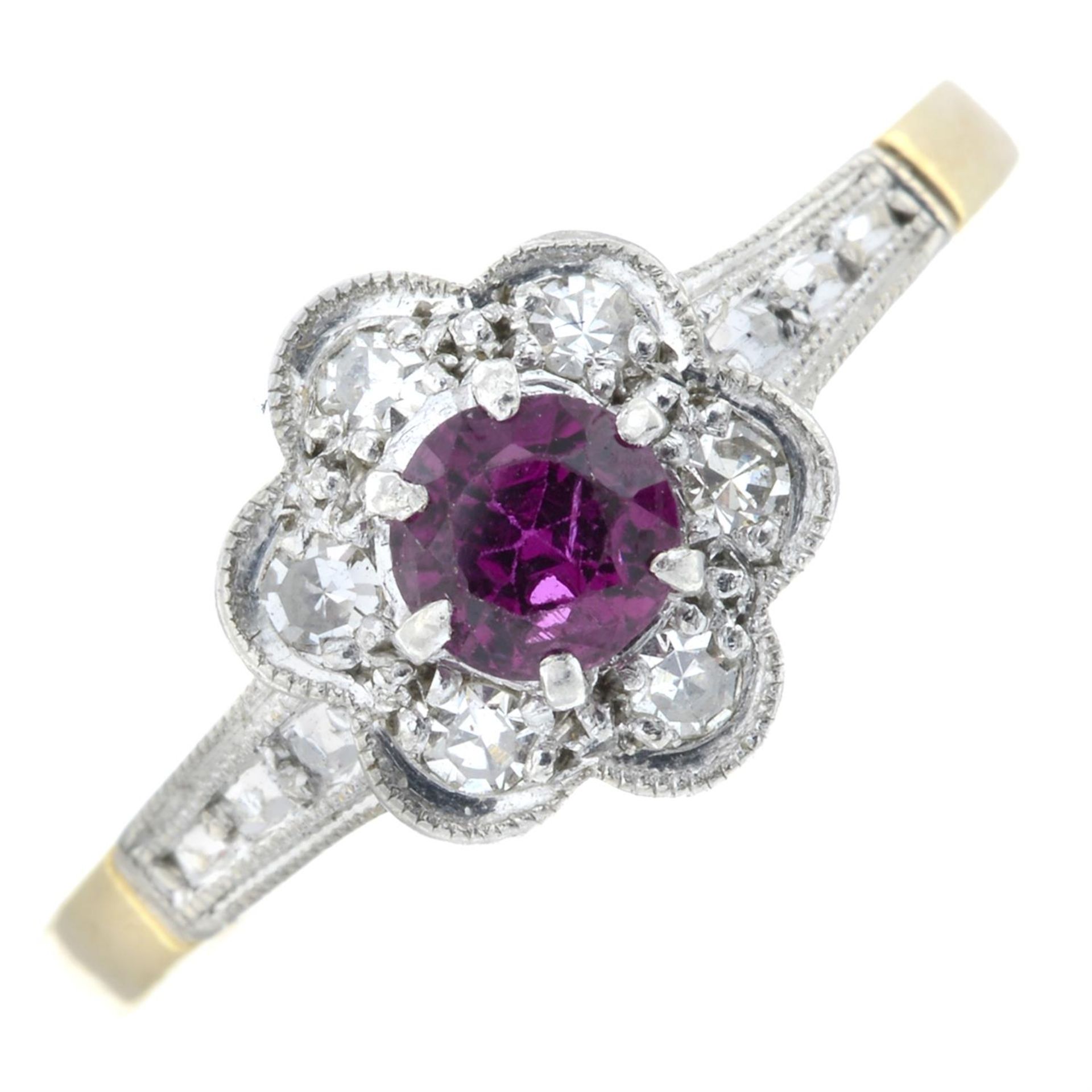 A synthetic ruby and diamond cluster ring.