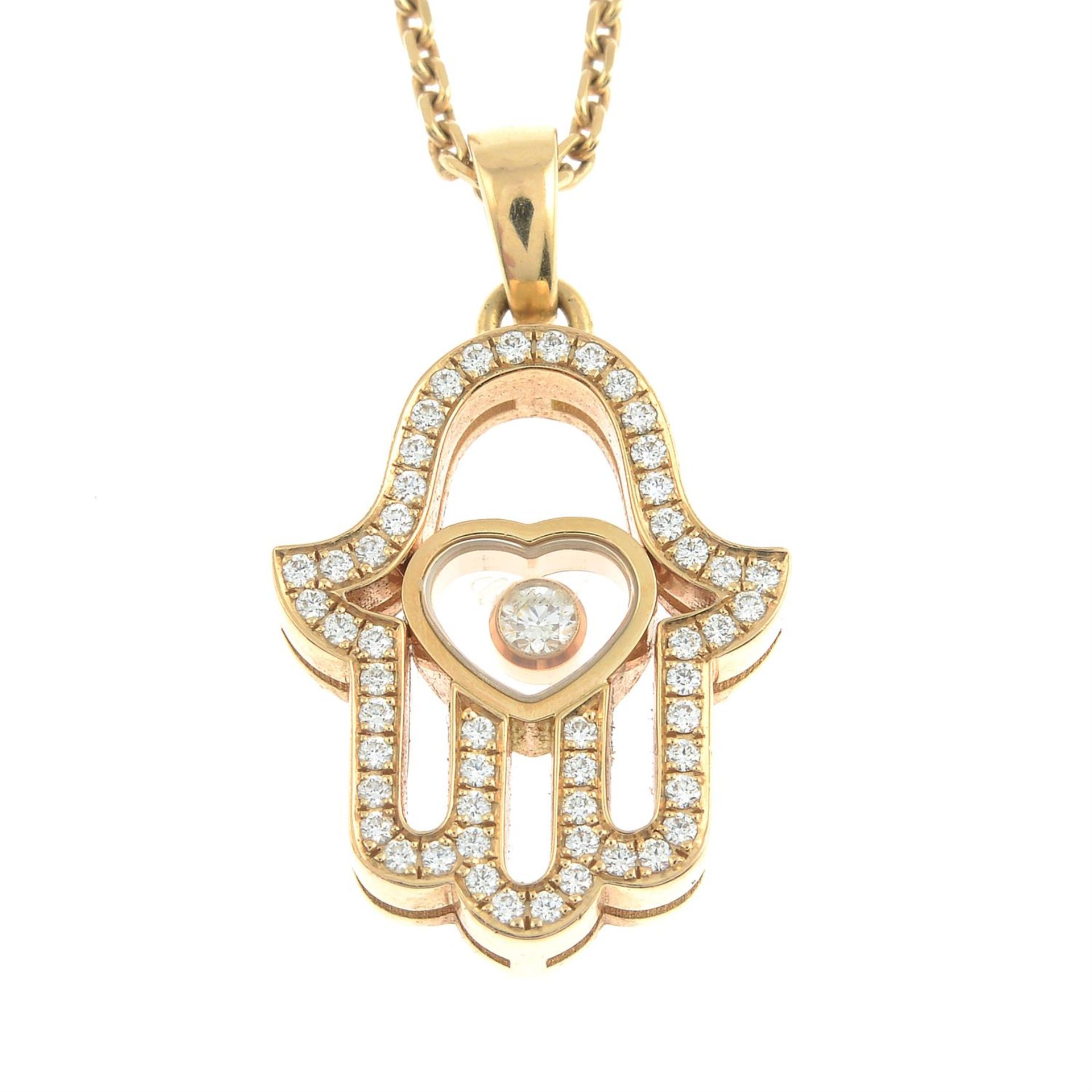 An 18ct gold brilliant-cut diamond 'Happy Diamonds' Hamsa Hand pendant, with chain, by Chopard. - Image 2 of 5