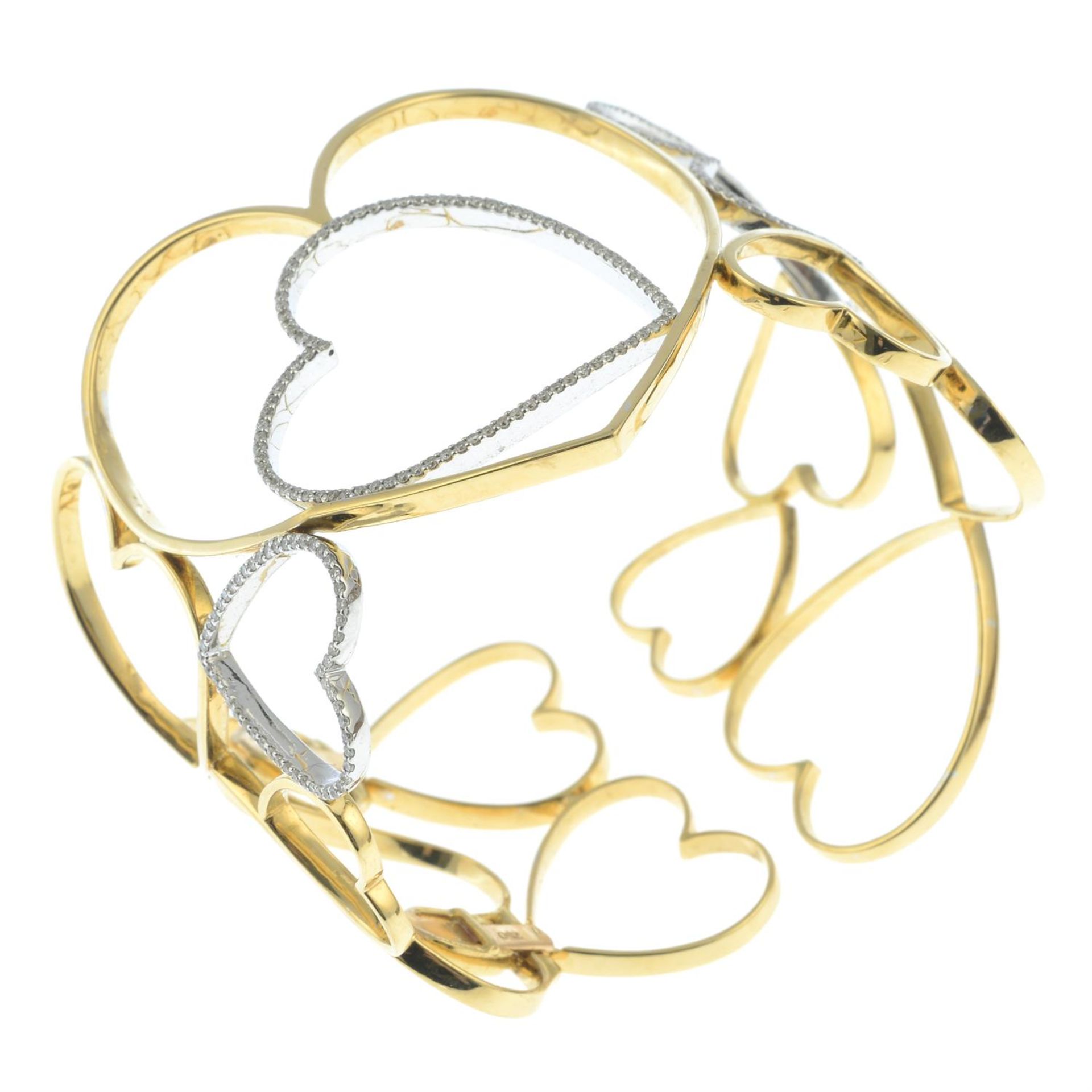 An openwork heart motif bangle, with diamond highlights. - Image 3 of 4