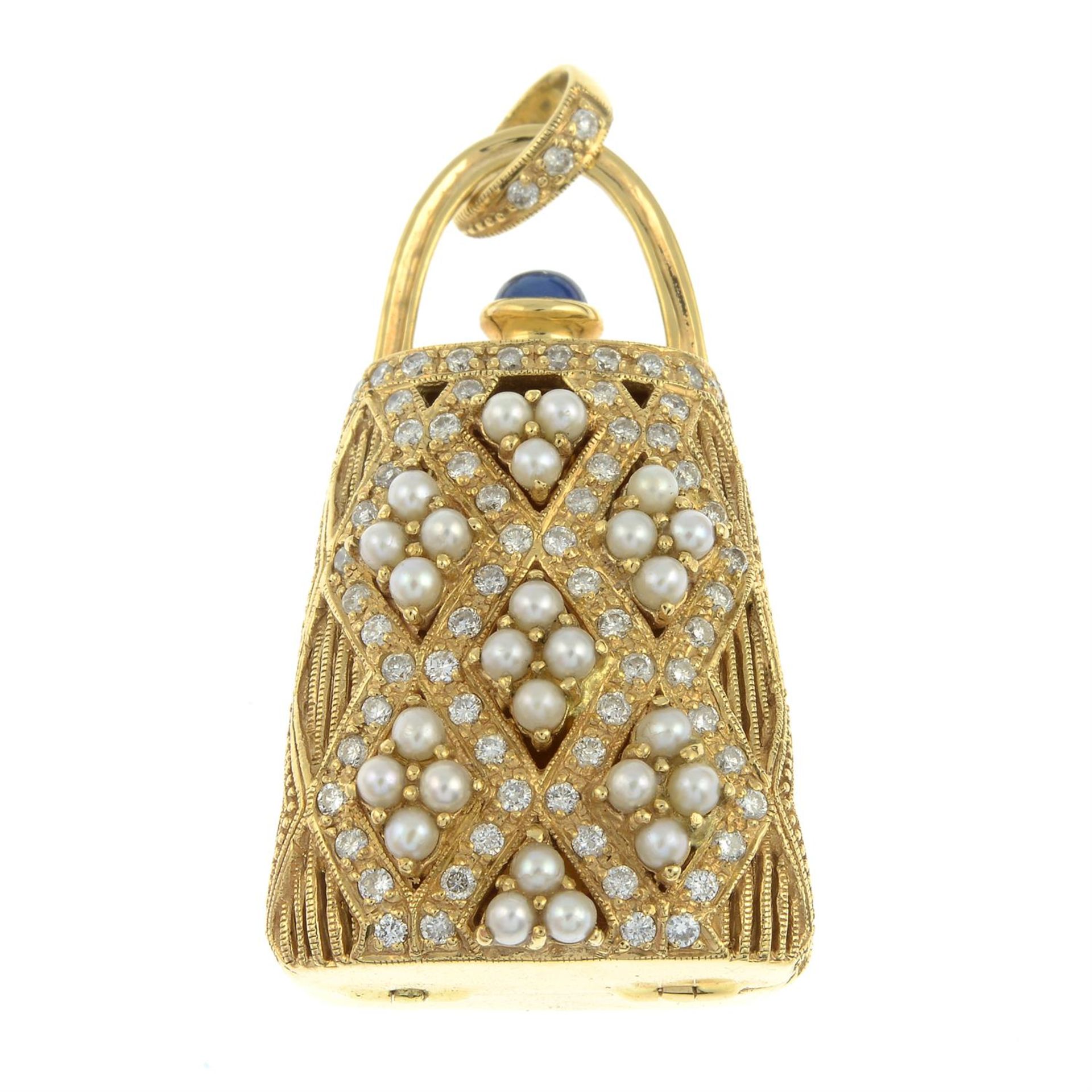 A brilliant-cut diamond and seed pearl travel bag charm, with sapphire push piece. - Image 2 of 5