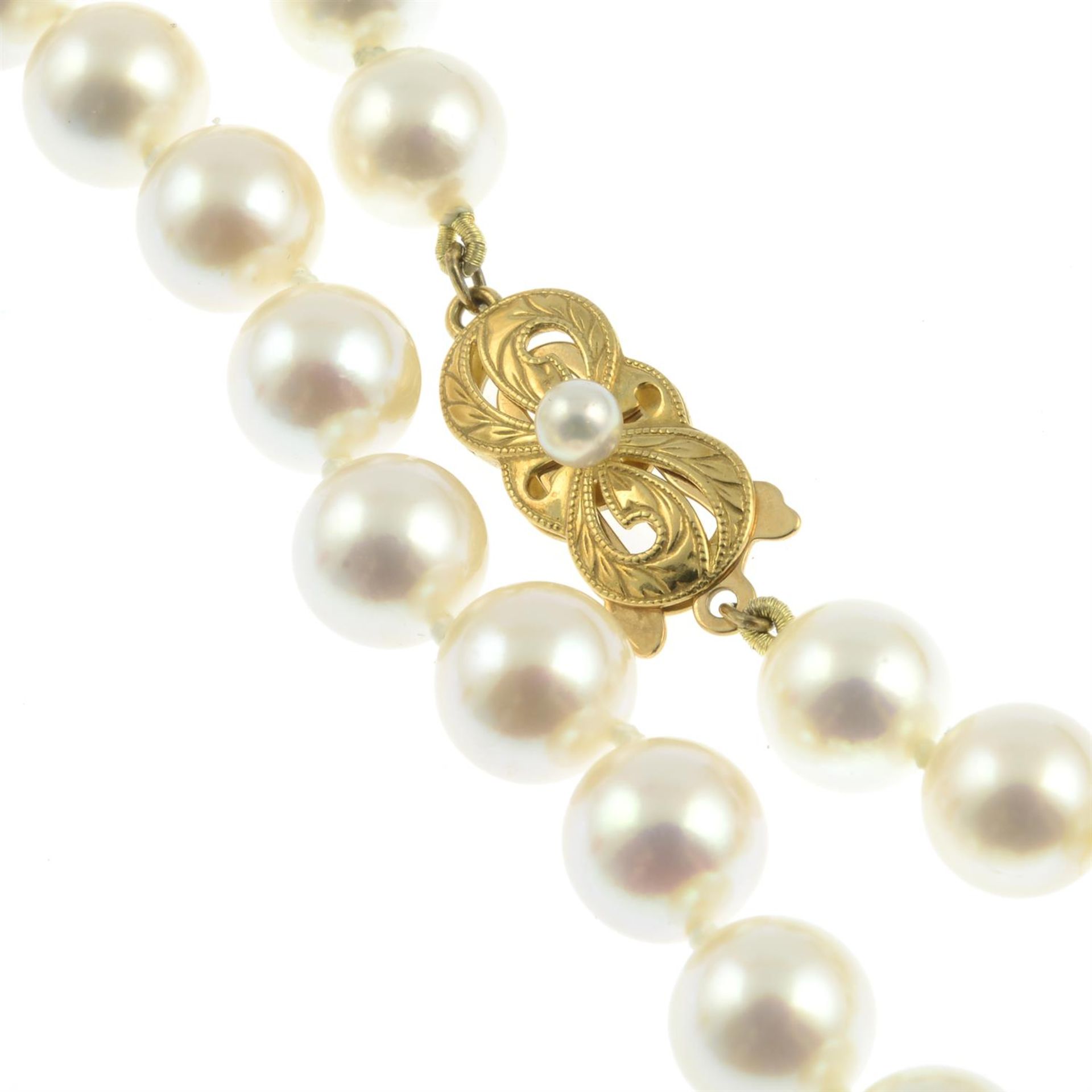 A slightly graduated cultured pearl single-strand necklace, by Mikimoto. - Image 3 of 4