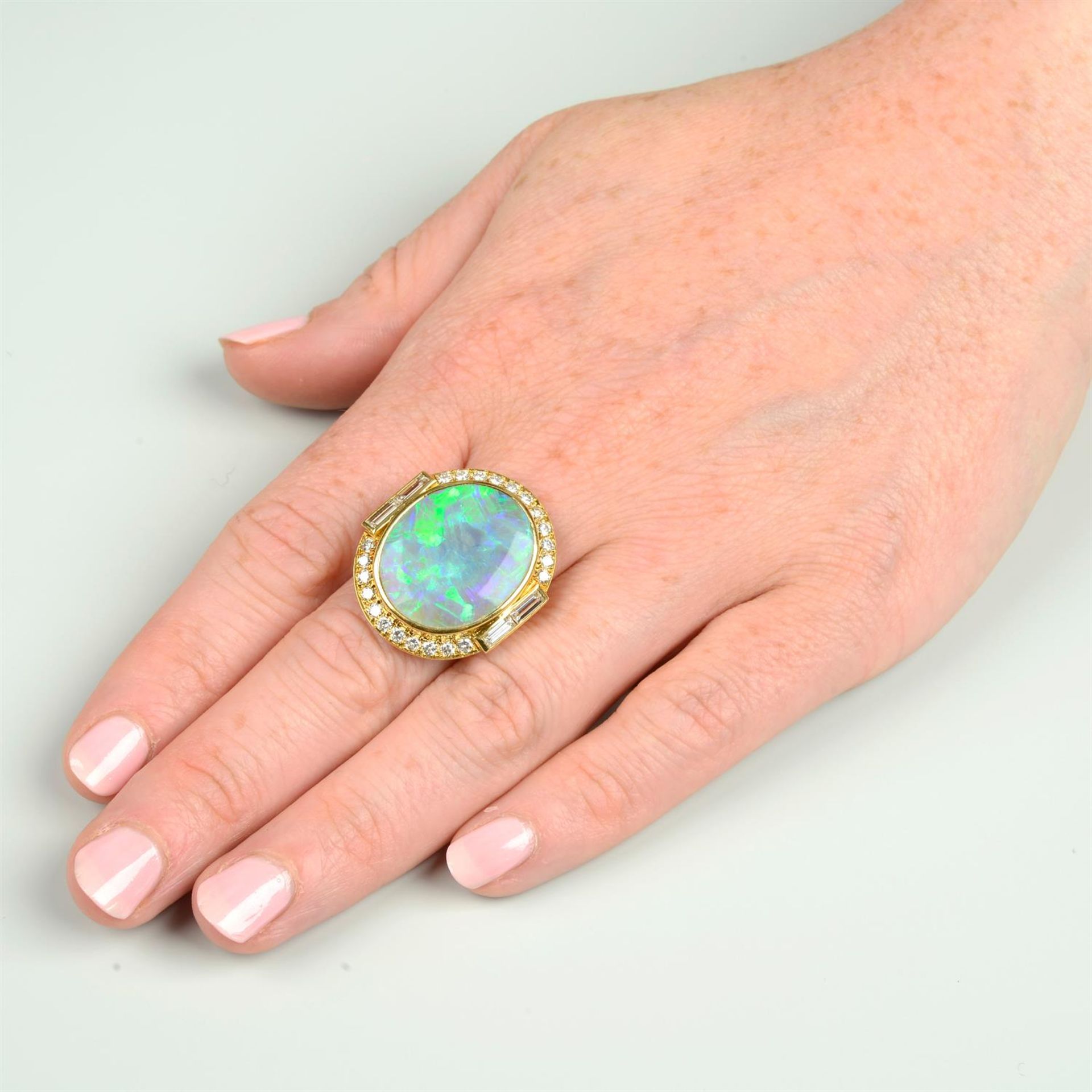 An opal dress ring, with baguette and brilliant-cut diamond surround. - Bild 6 aus 6