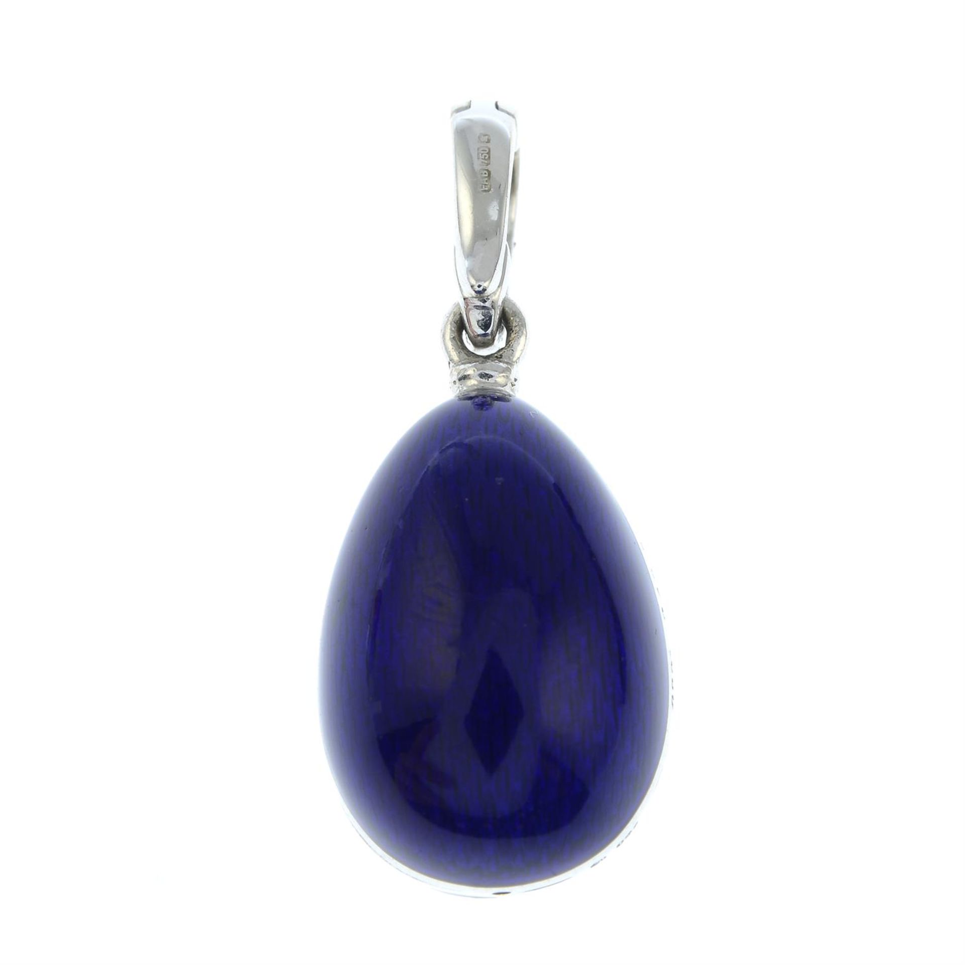 A limited edition 18ct gold brilliant-cut diamond and blue enamel egg pendant, by Fabergé. - Image 3 of 4