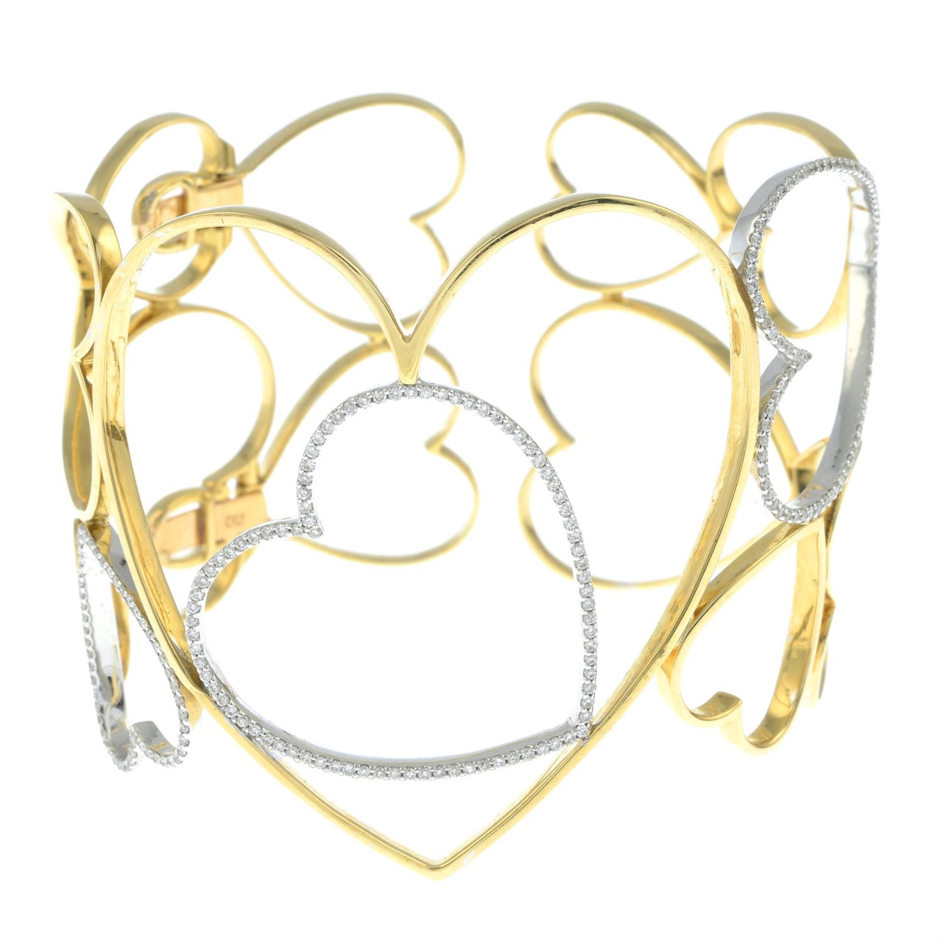 An openwork heart motif bangle, with diamond highlights. - Image 2 of 4