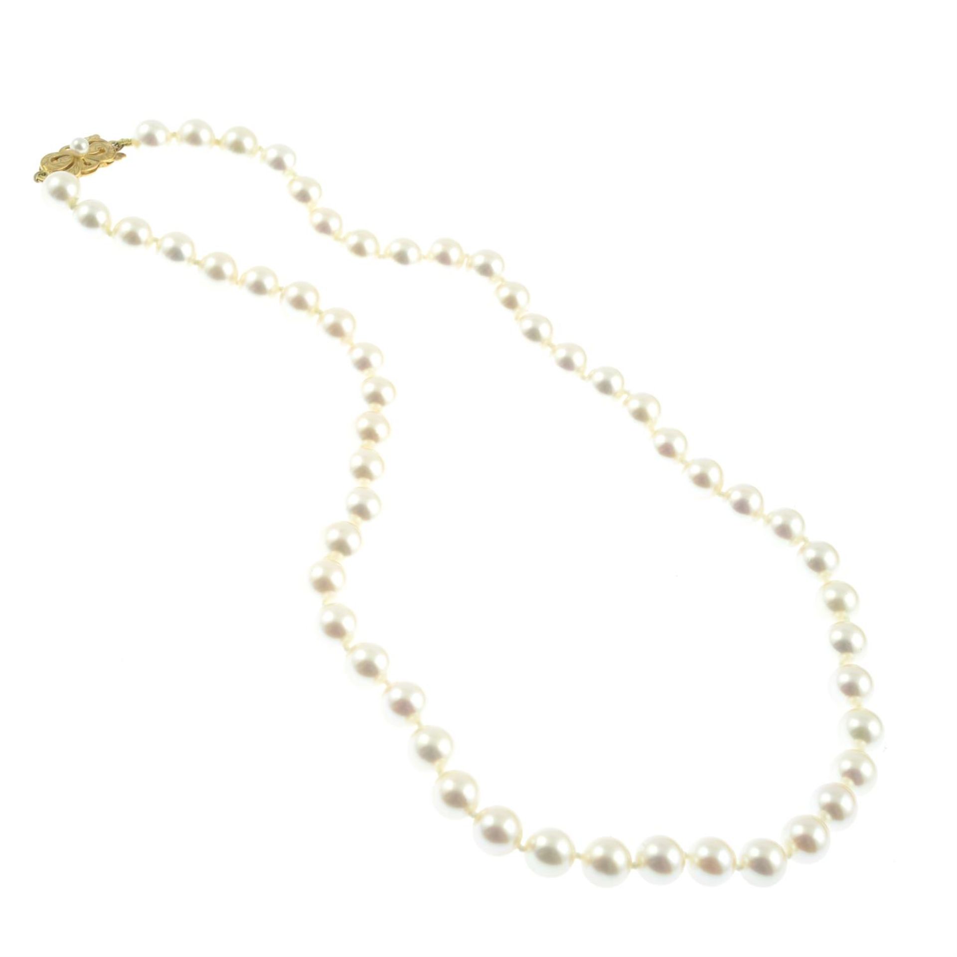 A slightly graduated cultured pearl single-strand necklace, by Mikimoto. - Image 2 of 4