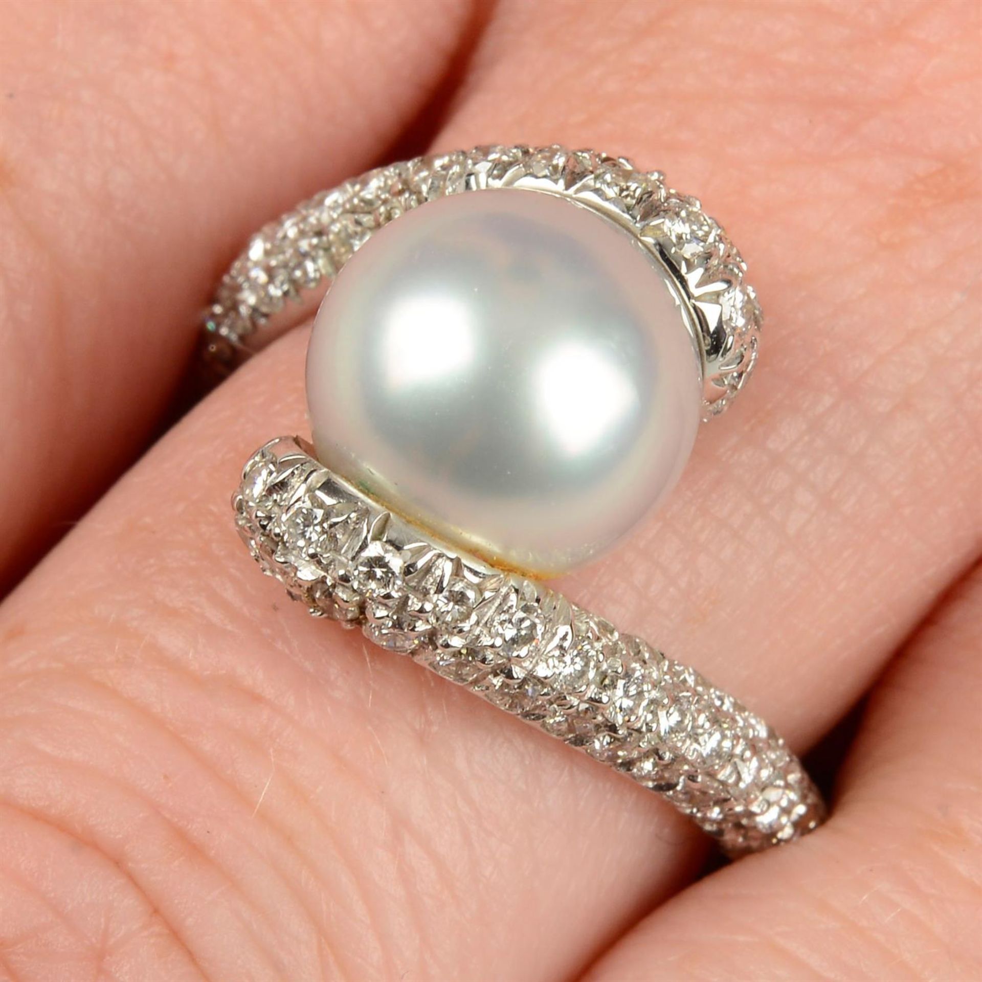 A cultured pearl and pavé-set diamond dress ring, by Mikimoto.
