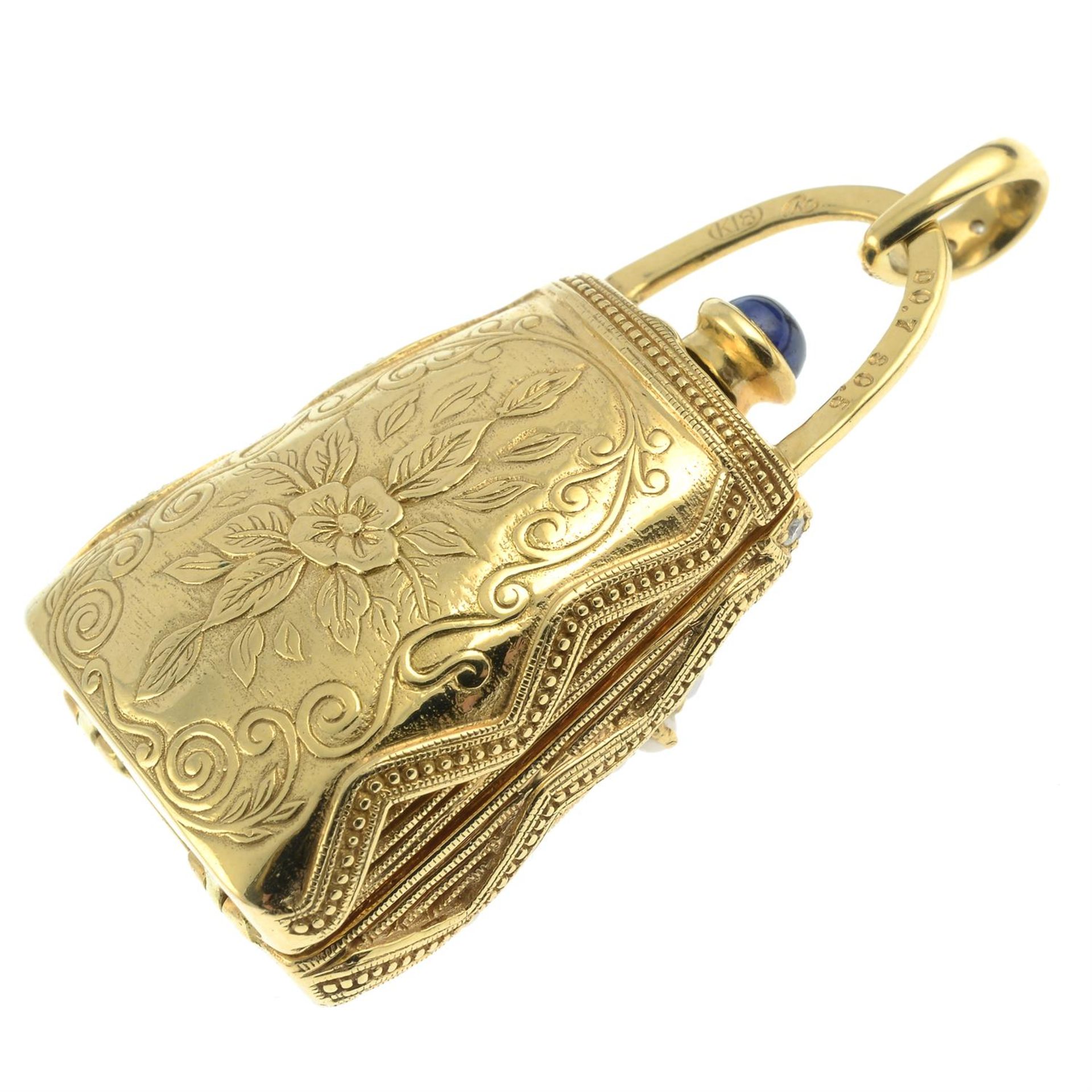 A brilliant-cut diamond and seed pearl travel bag charm, with sapphire push piece. - Image 3 of 5