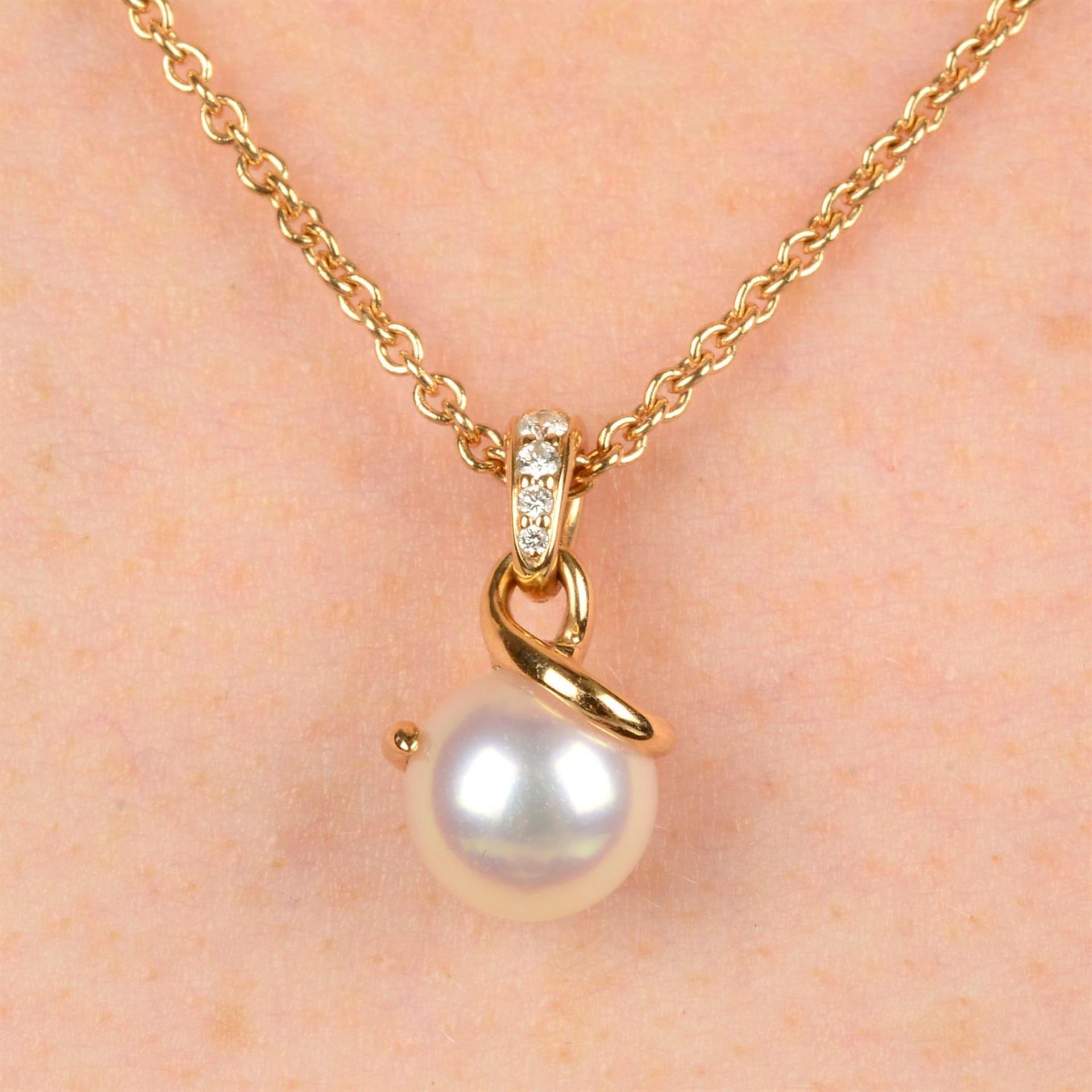 An 18ct gold Akoya cultured pearl and pavé-set diamond 'Twist' pendant, with chain, by Mikimoto.