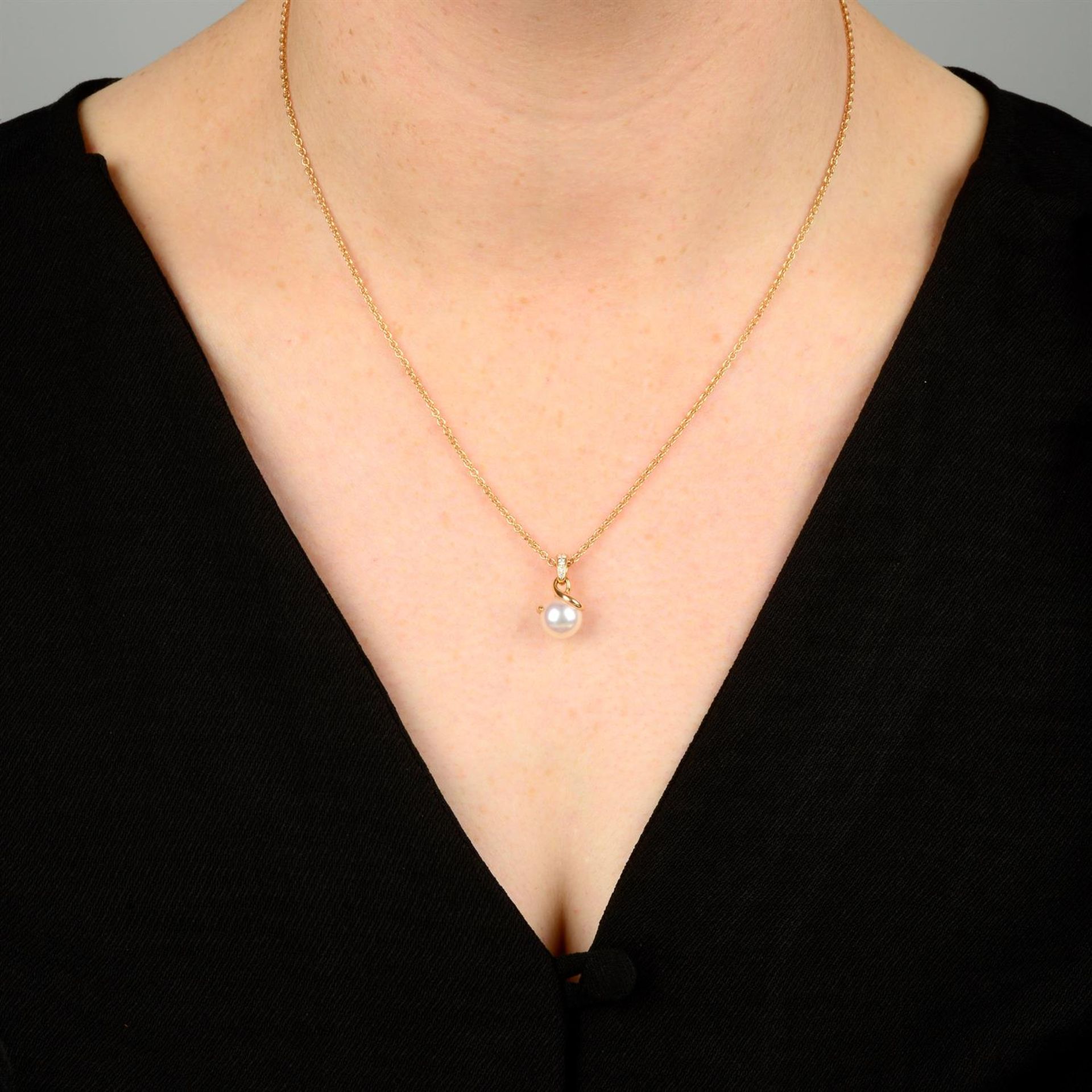 An 18ct gold Akoya cultured pearl and pavé-set diamond 'Twist' pendant, with chain, by Mikimoto. - Image 5 of 5