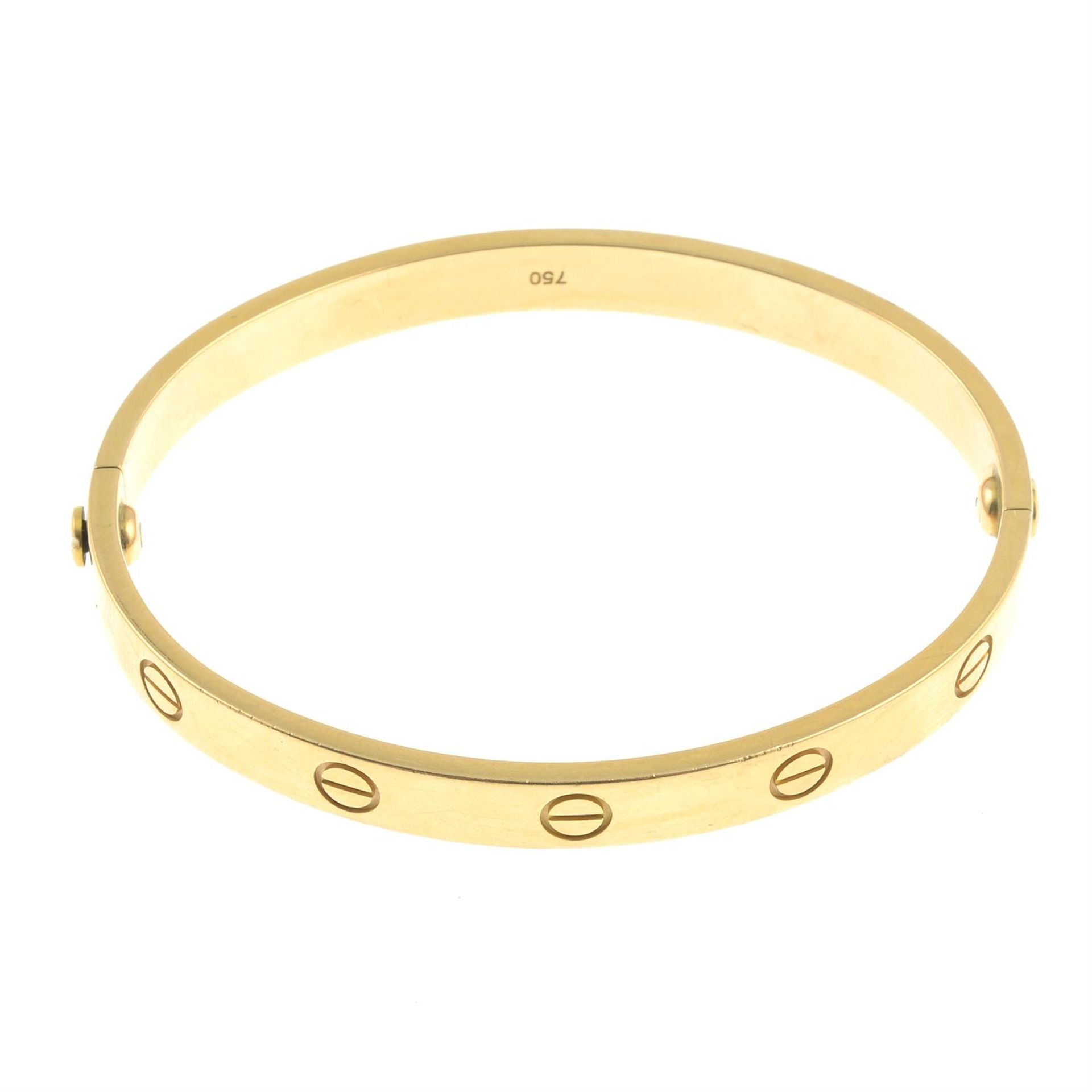 An 18ct gold 'Love' bangle, by Cartier. - Image 3 of 4