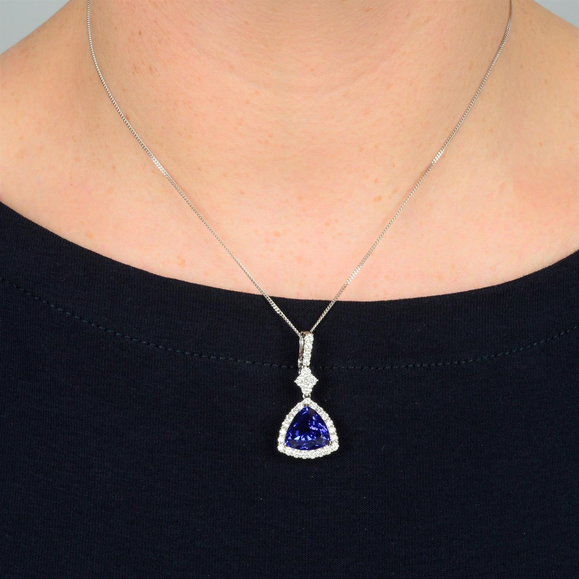 A tanzanite and brilliant-cut diamond pendant. - Image 4 of 4