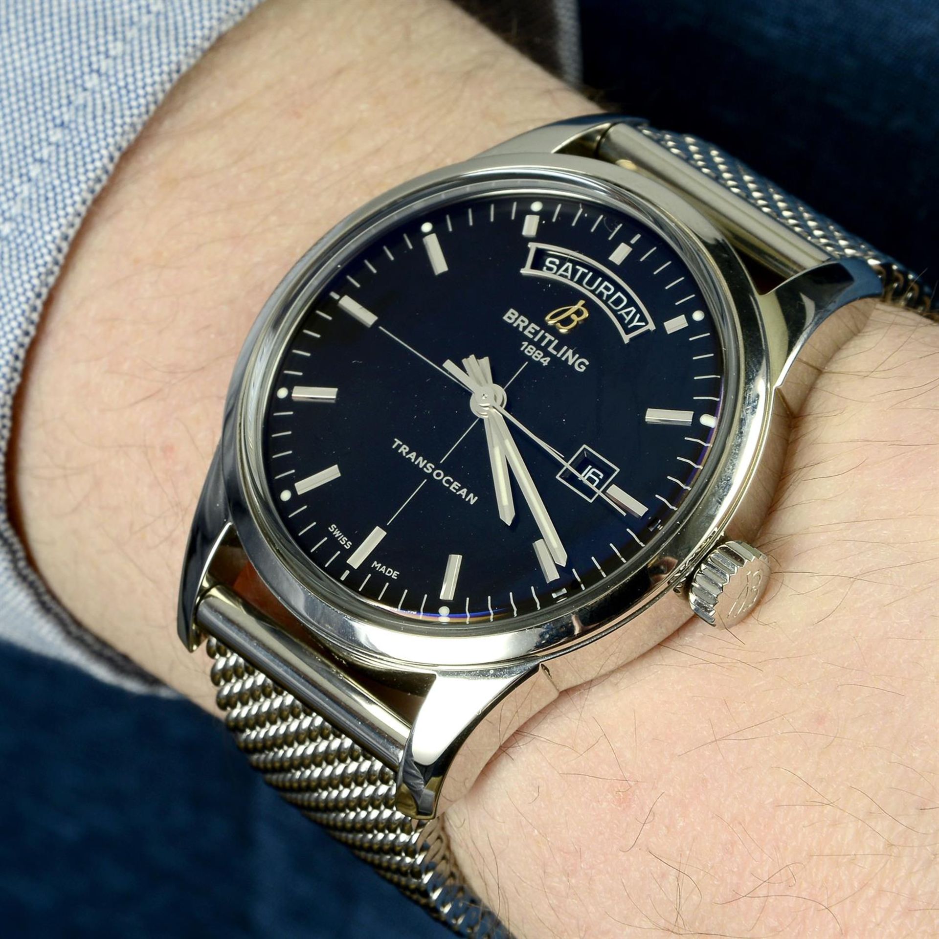 BREITLING - a stainless steel Transocean Day & Date bracelet watch, 43mm. - Image 6 of 6
