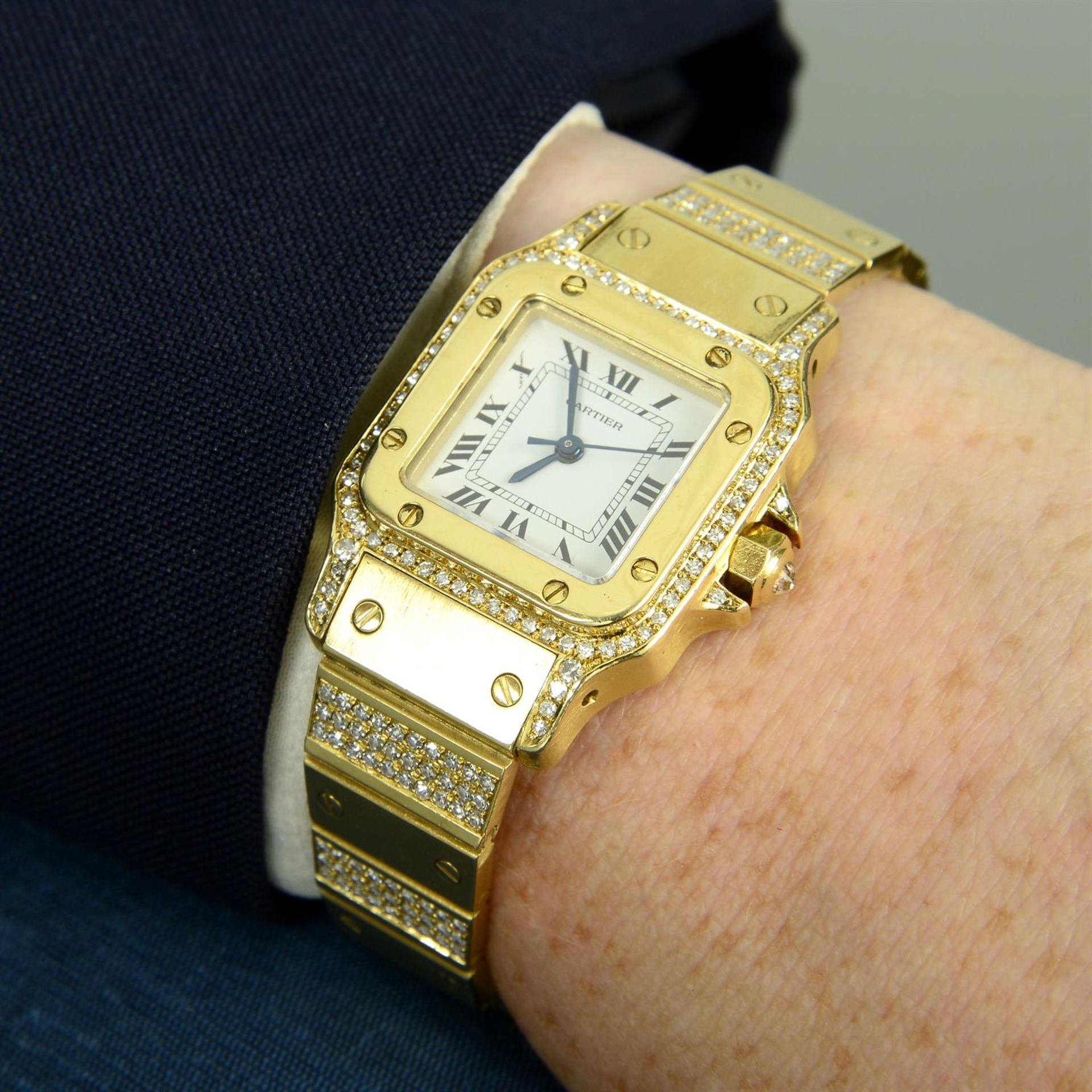 CARTIER - an 18ct gold diamond set Santos bracelet watch, 24mm. - Bild 5 aus 5