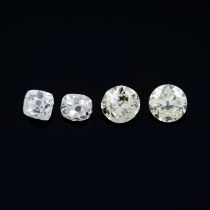 Four old cut diamonds, weighing 0.98ct