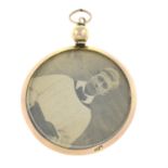 An early 20th century gold glazed locket pendant.