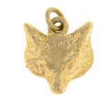 A 9ct gold fox mask charm.
