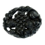 A late Victorian jet brooch, carved to depict fruit motif.