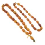 Two amber beaded necklaces.