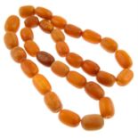 An amber single-strand necklace.