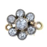 An old-cut diamond floral cluster clasp.