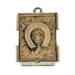 A late 19th century gold locket pendant, with horseshoe motif.