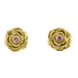A pair of 18ct gold pink sapphire floral stud earrings.