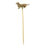 An early 20th century gold dachshund stickpin.