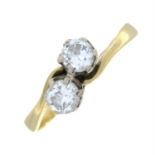 An 18ct gold old-cut diamond two-stone crossover ring.