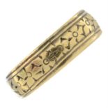 A late Victorian 18ct gold floral band ring.