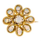 An early 20th century 15ct gold opal floral brooch.