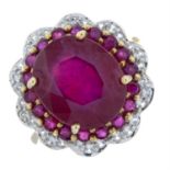 A 9ct gold ruby and diamond cluster ring.