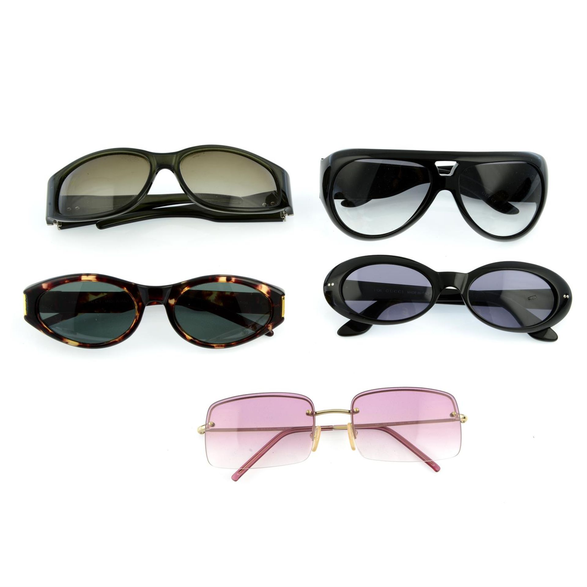 GUCCI - five pairs of sunglasses.