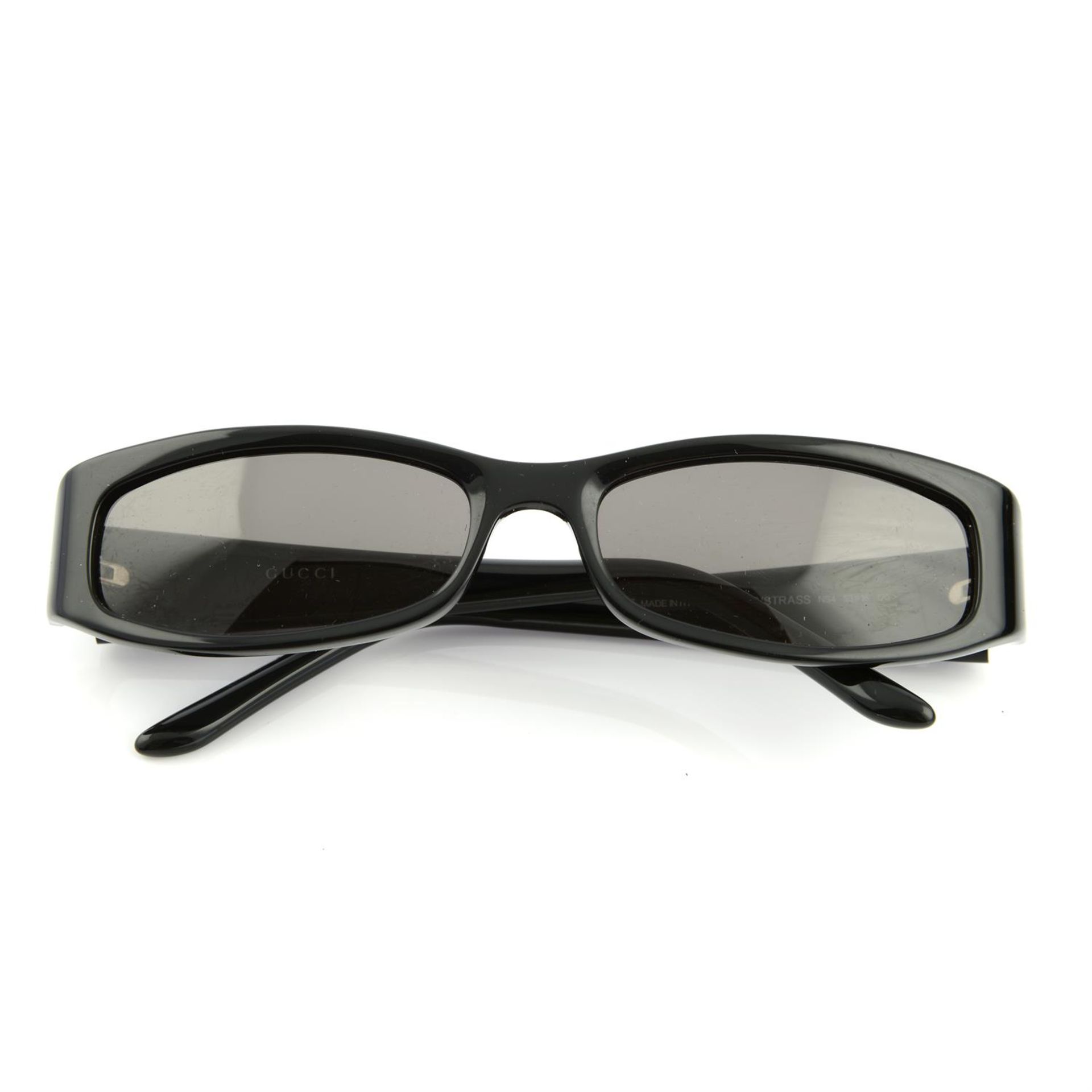 GUCCI - a pair of sunglasses.