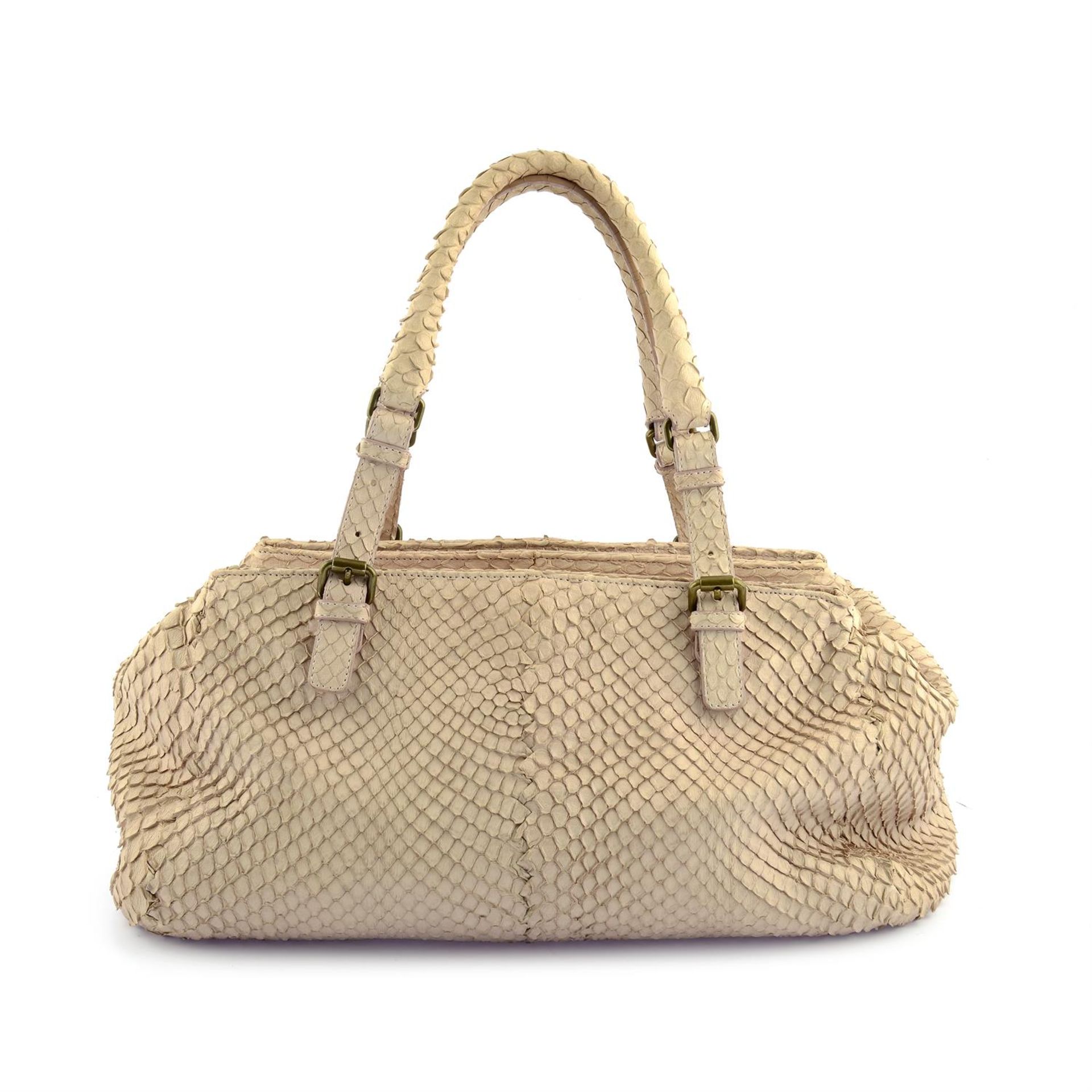 BOTTEGA VENETA - a beige Python leather handbag.