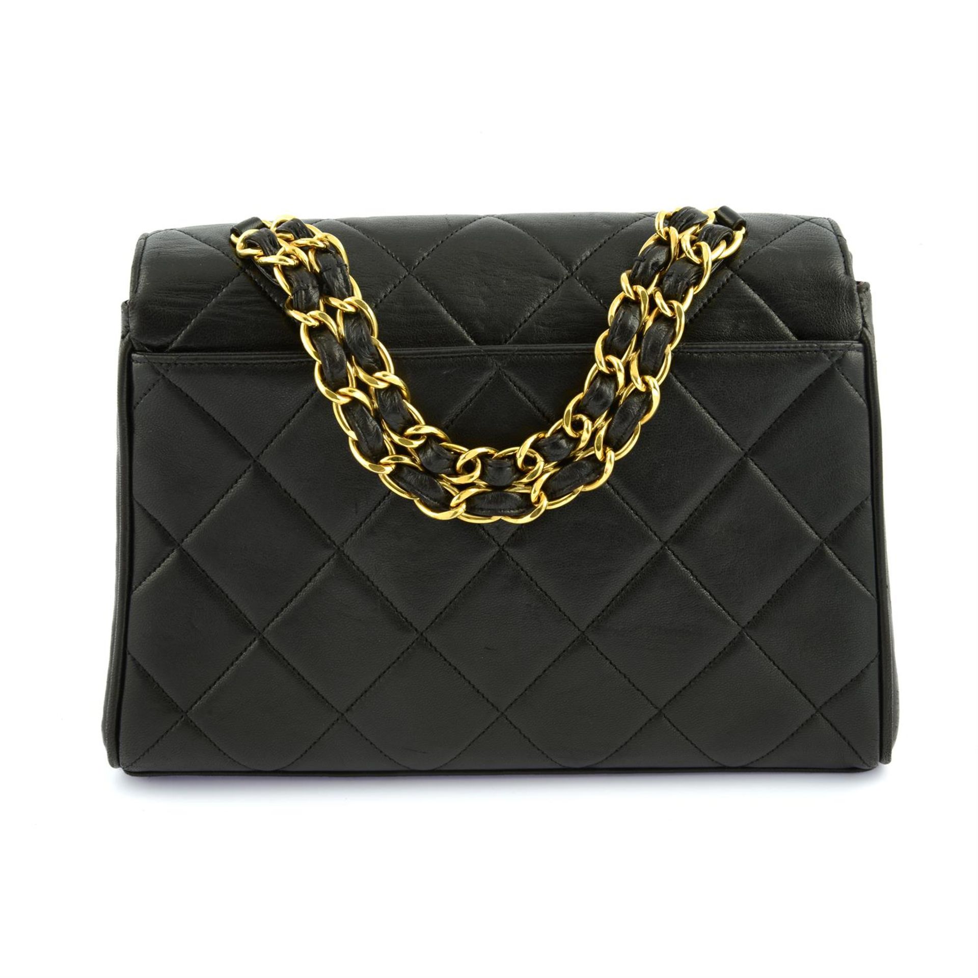 CHANEL - a black lambskin leather top handle single flap handbag. - Image 2 of 5