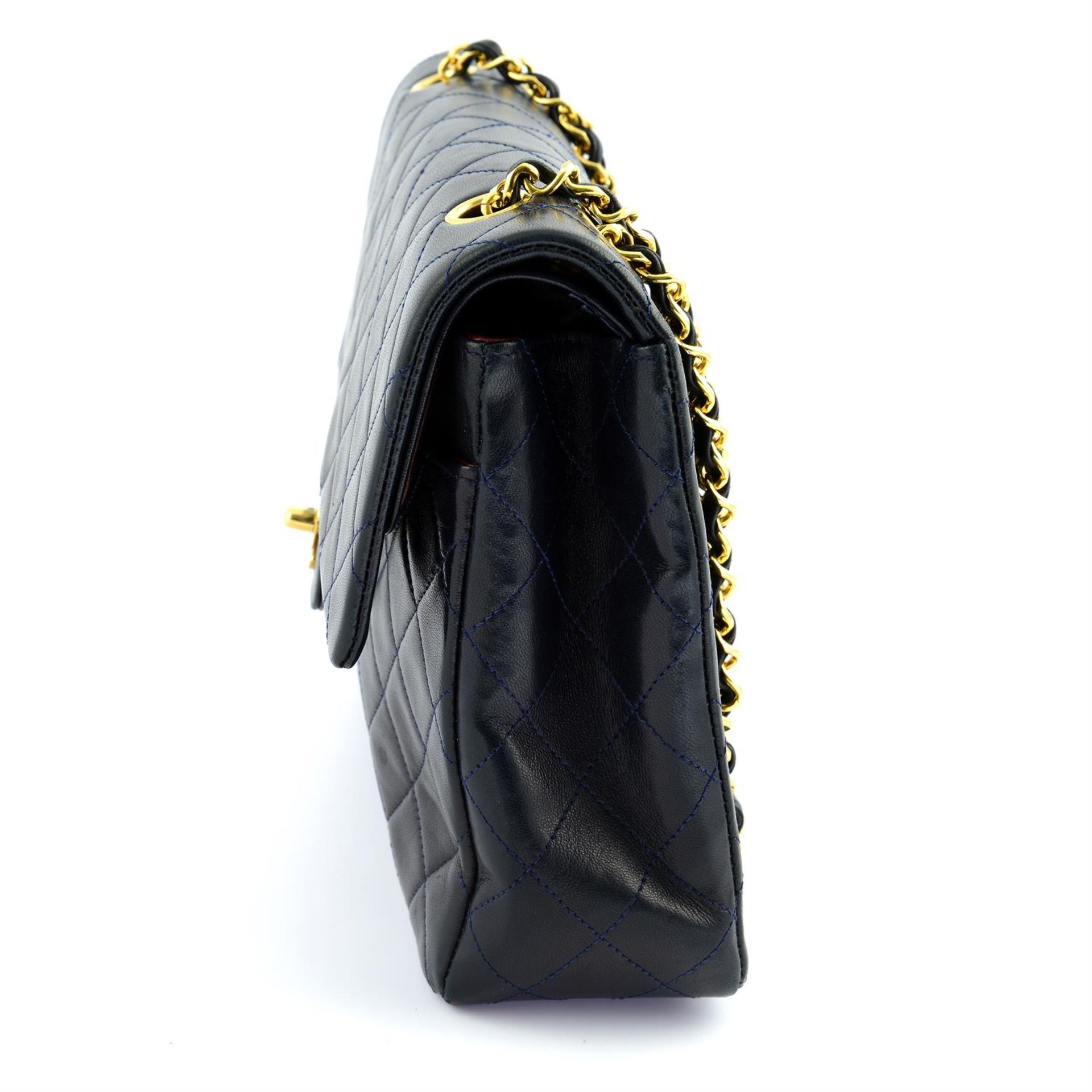 CHANEL - a navy lambskin leather classic double flap handbag. - Bild 3 aus 4